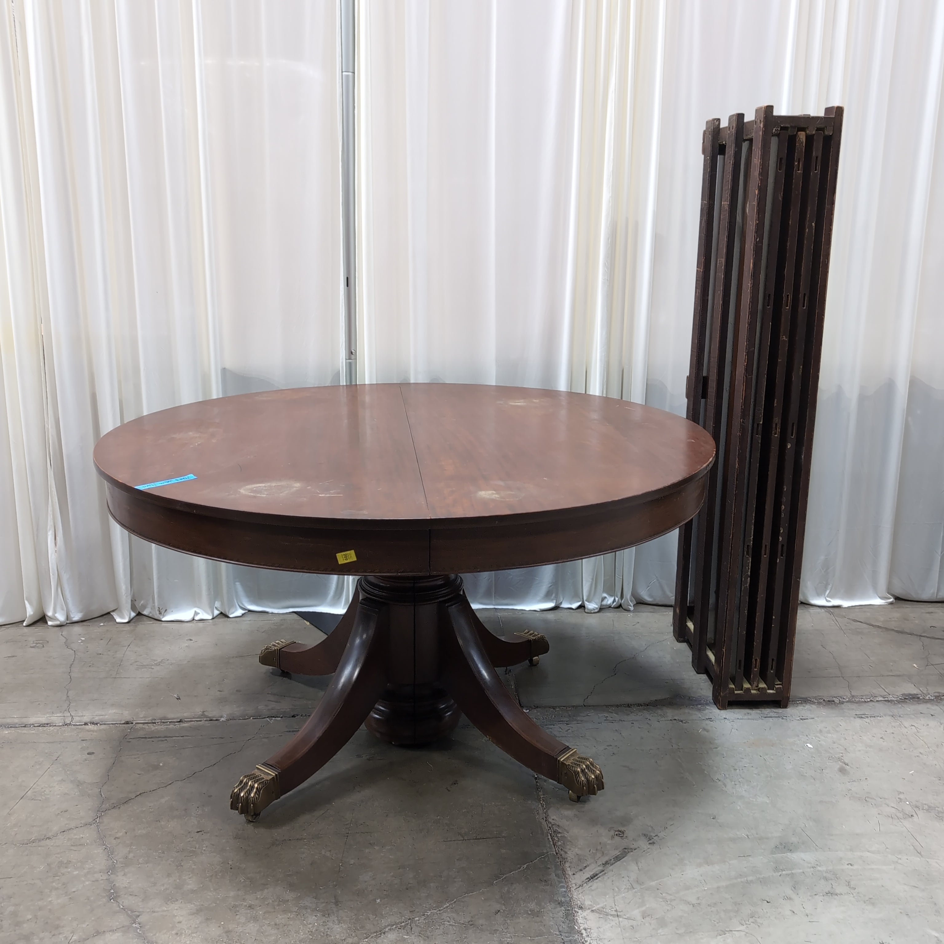 Round Dark Wood Pedestal Dining Table with Claw Feet