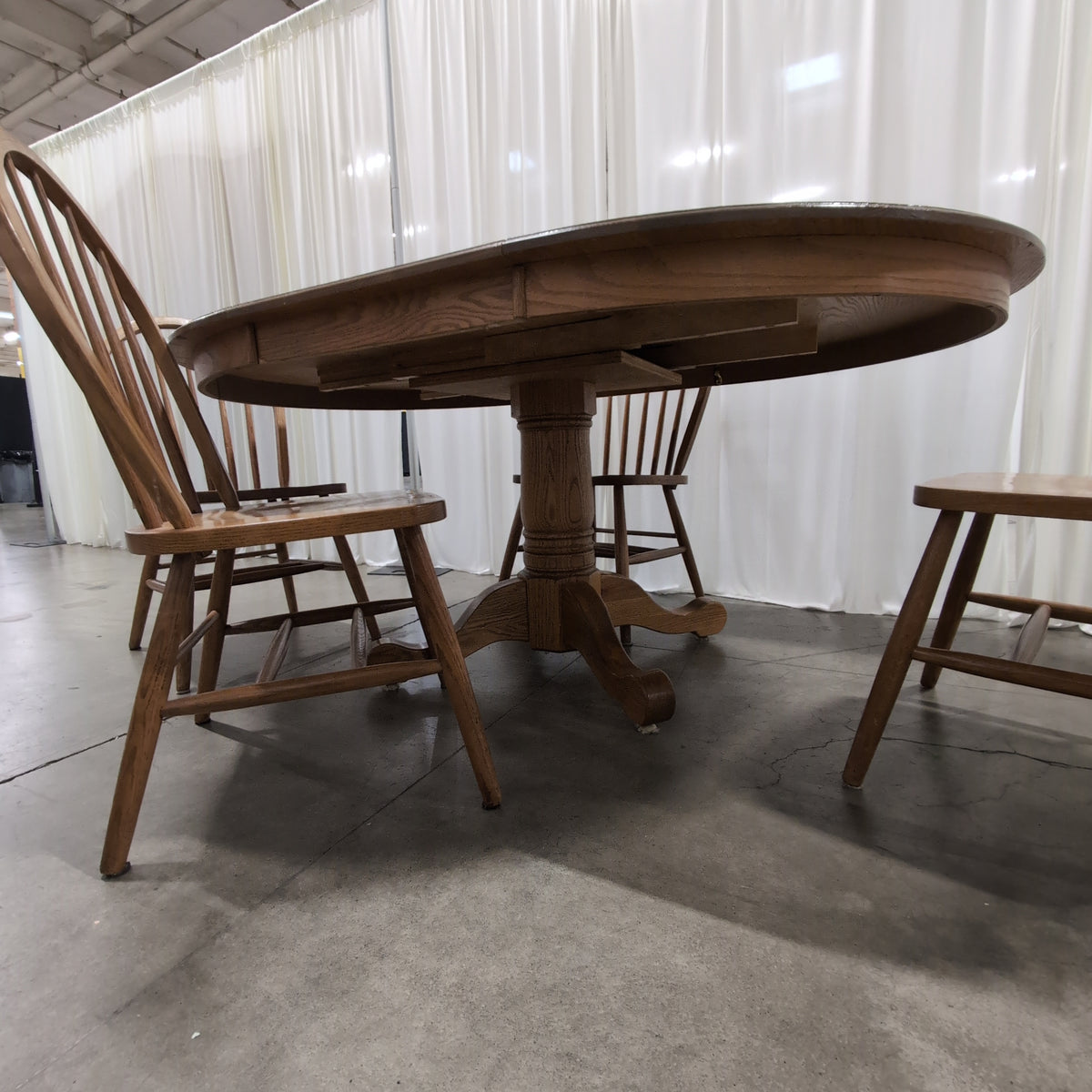 Oval Pedestal Wood Dining Table with Windsor Chairs