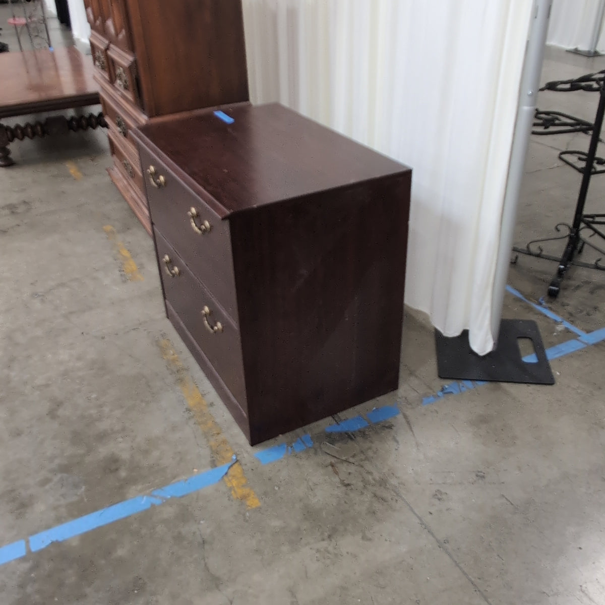 Dark Wood Two-Drawer Dresser with Ornate Hardware