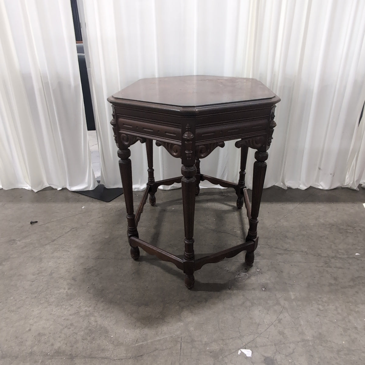 Dark Wood Hexagonal End Table with Carved Legs
