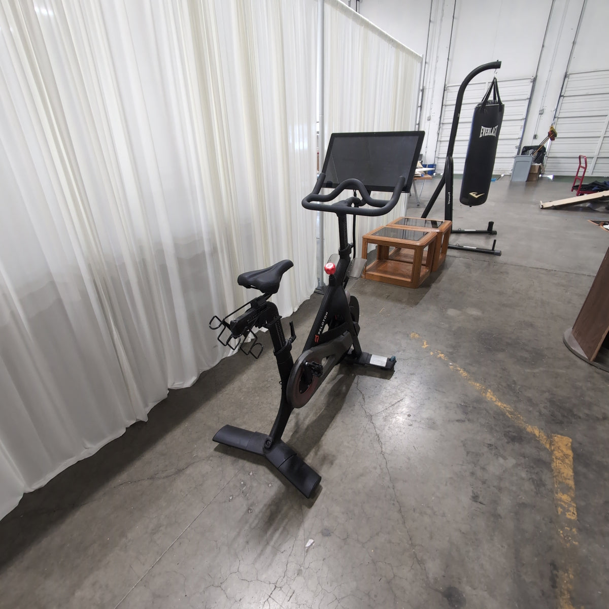 Peloton Black Exercise Bike with Interactive Screen