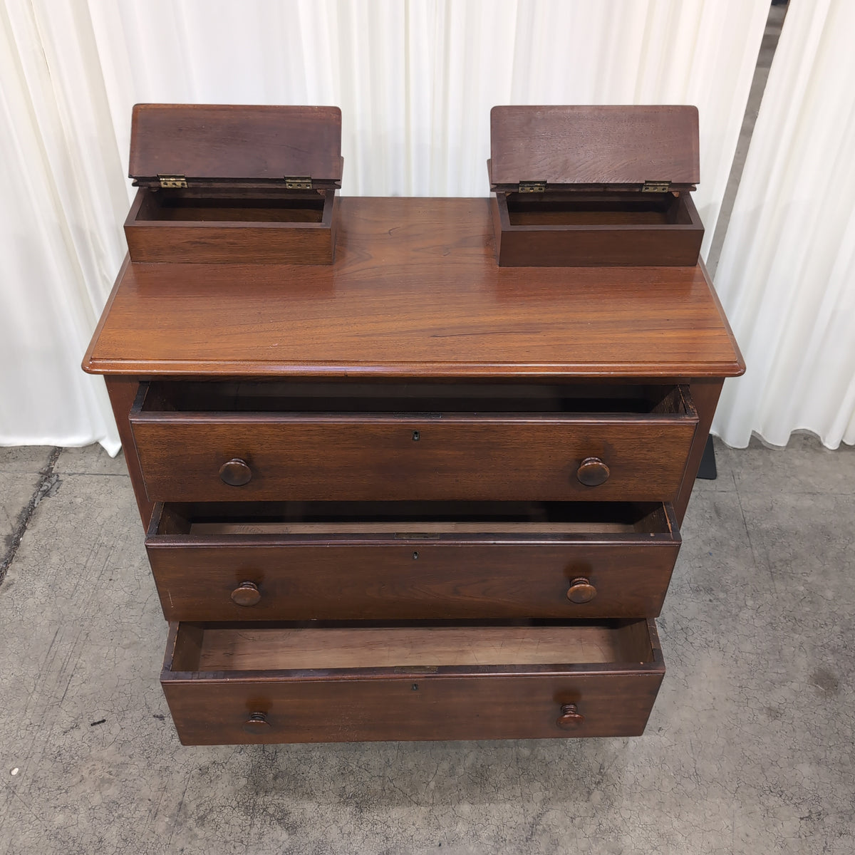 Traditional Reddish-Brown Wood Nightstand with Three Drawers