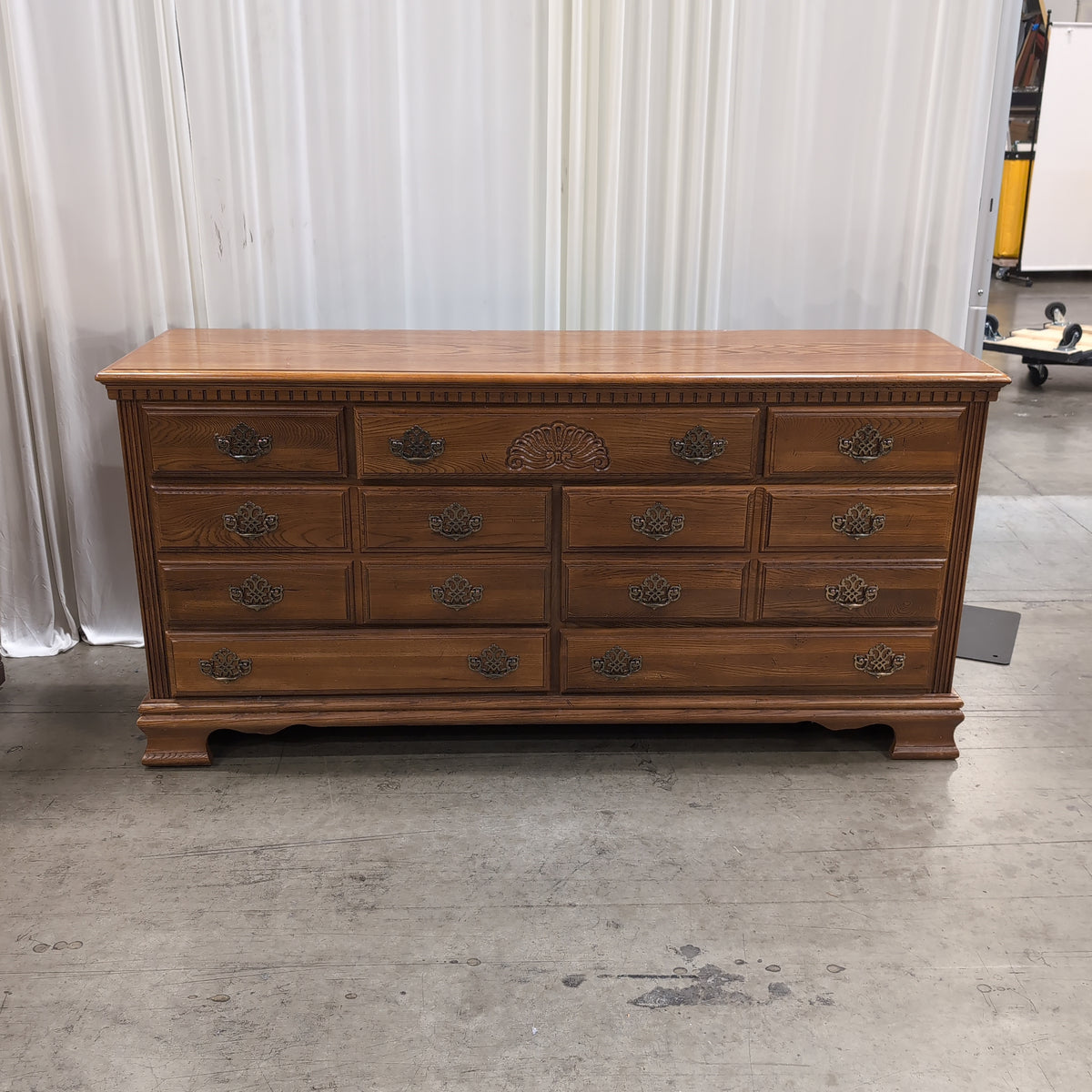 Traditional Brown Wood Dresser with Ornate Hardware