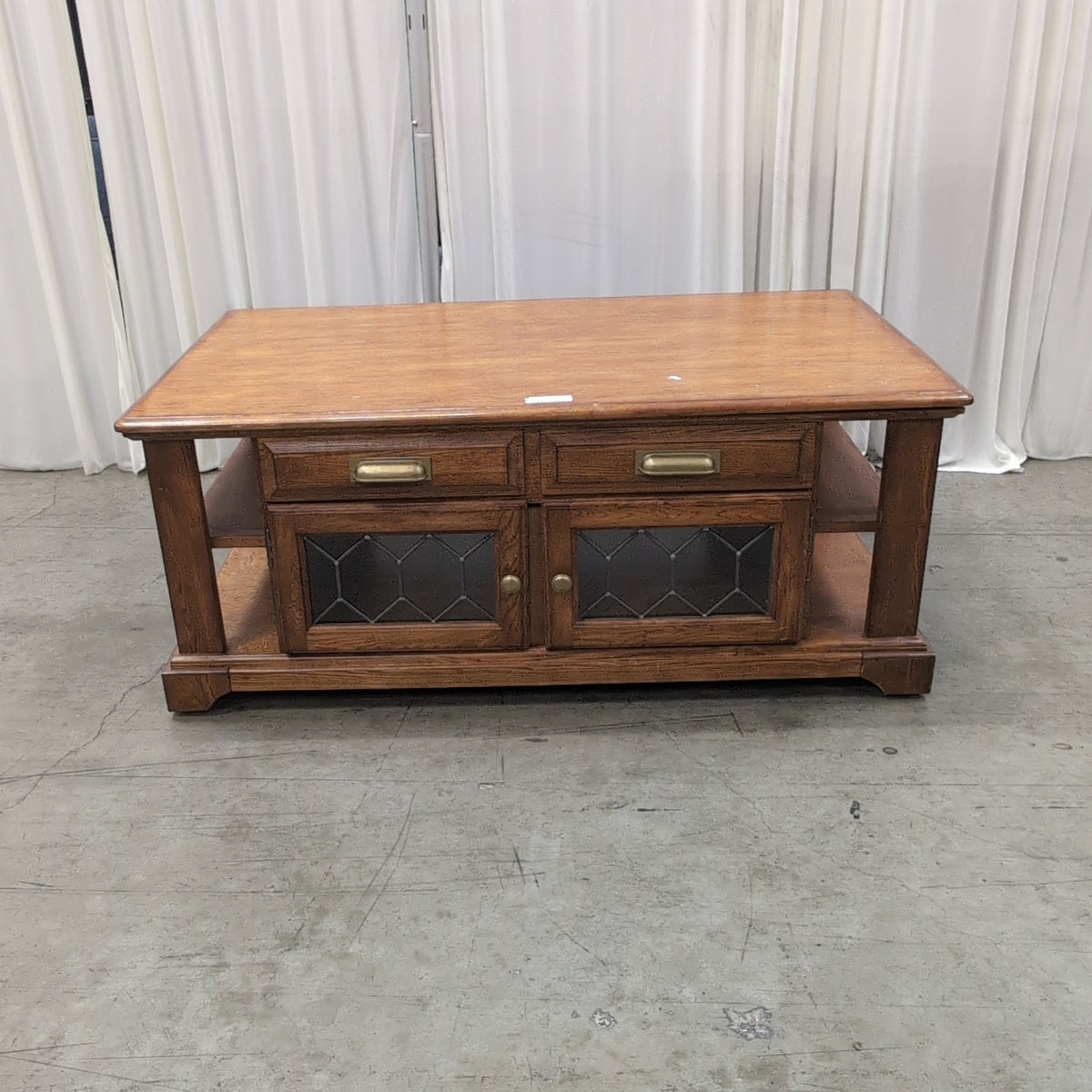 Brown Wood Coffee Table with Patterned Glass Doors