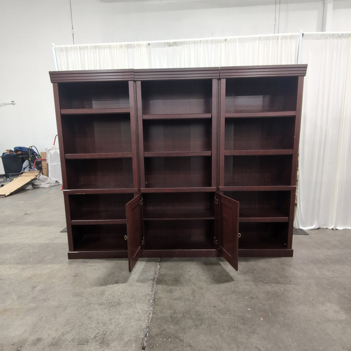 Sauder Dark Brown Three-Section Bookcase with Cabinet Doors