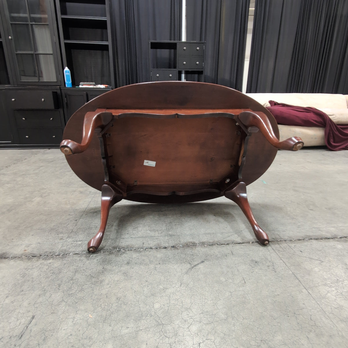 Dark Cherry Oval Wood Coffee Table with Cabriole Legs