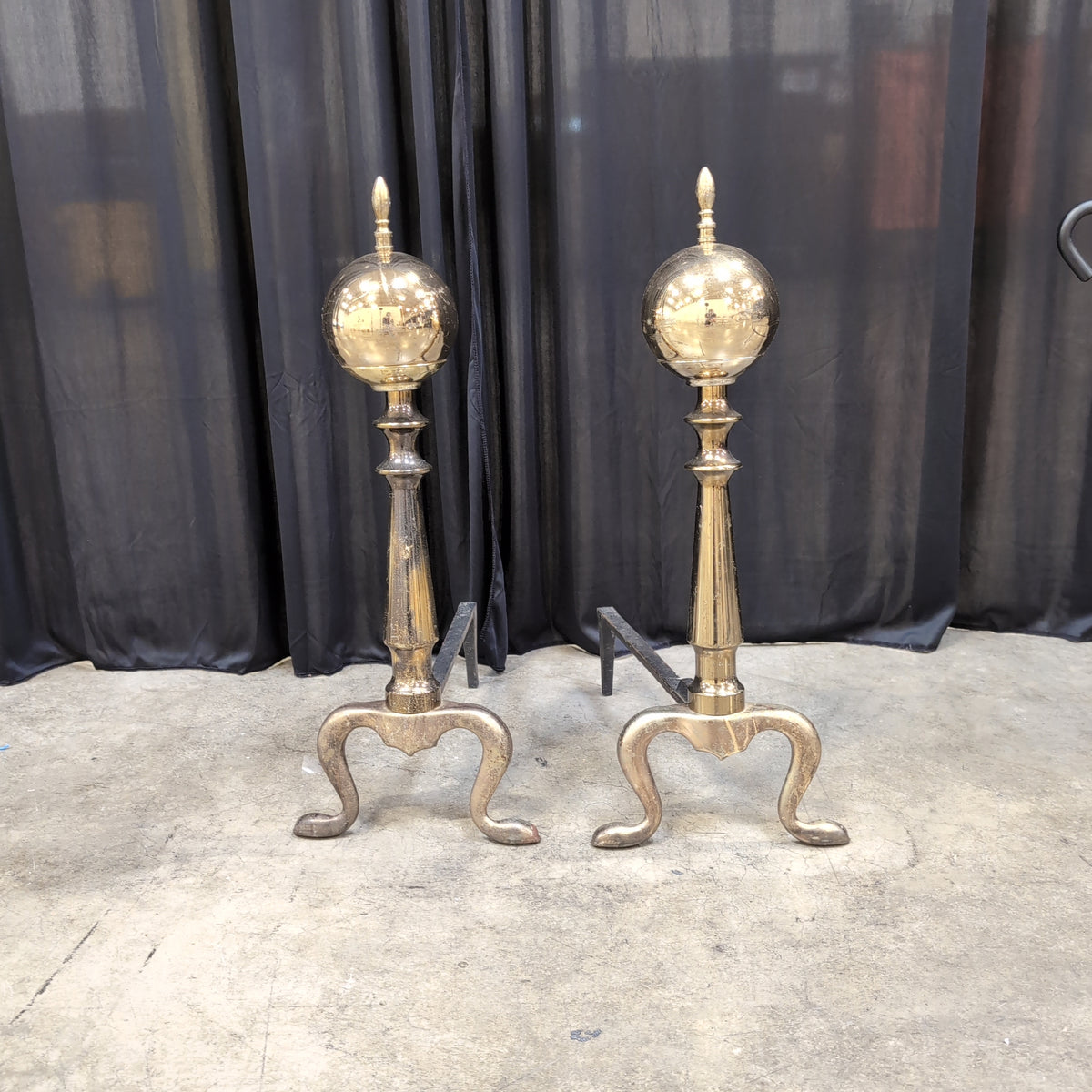 Pair of vintage polished brass cannonball Log Supports
