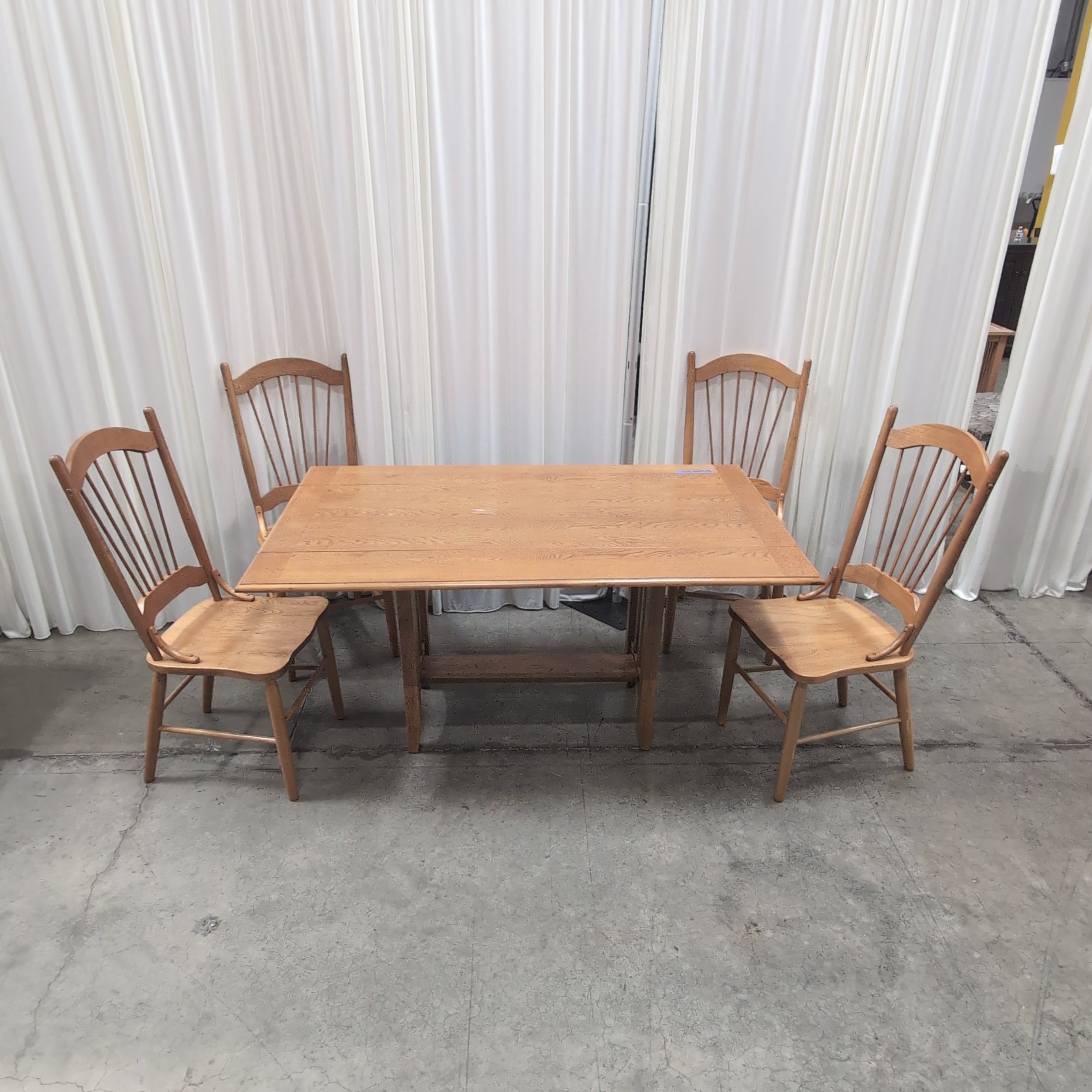 Oak Tone Drop Leaf Dining Table with Spindle Back Chairs