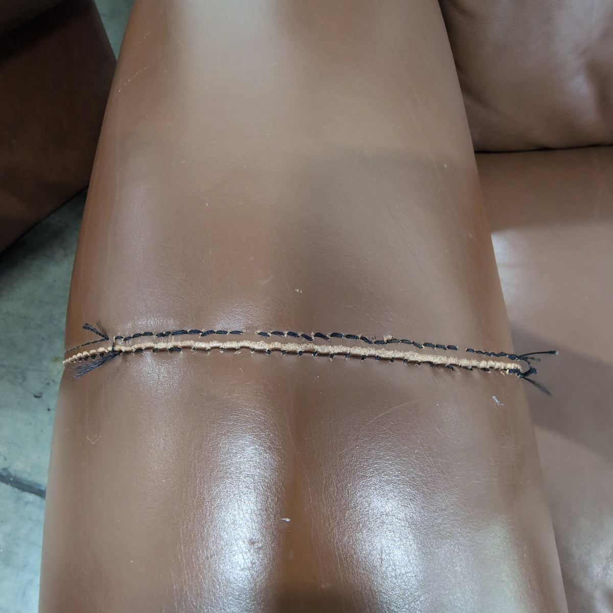 Brown Leather Curved Sectional Couch