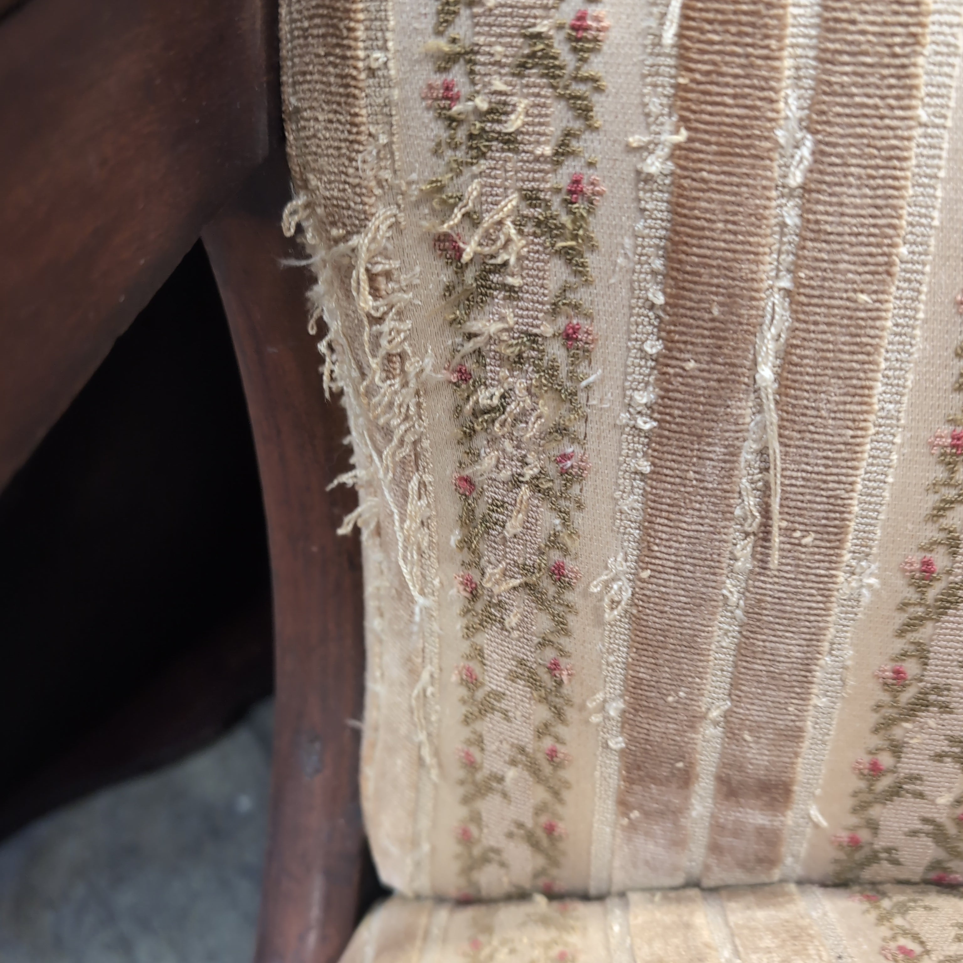 Ornate Carved Wood Upholstered Armchair with Floral Stripes