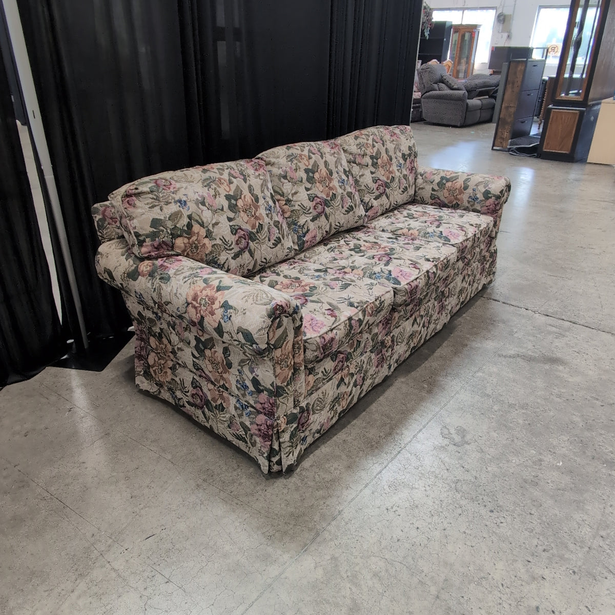 Multi-Color Floral Pattern Couch with Rolled Arms