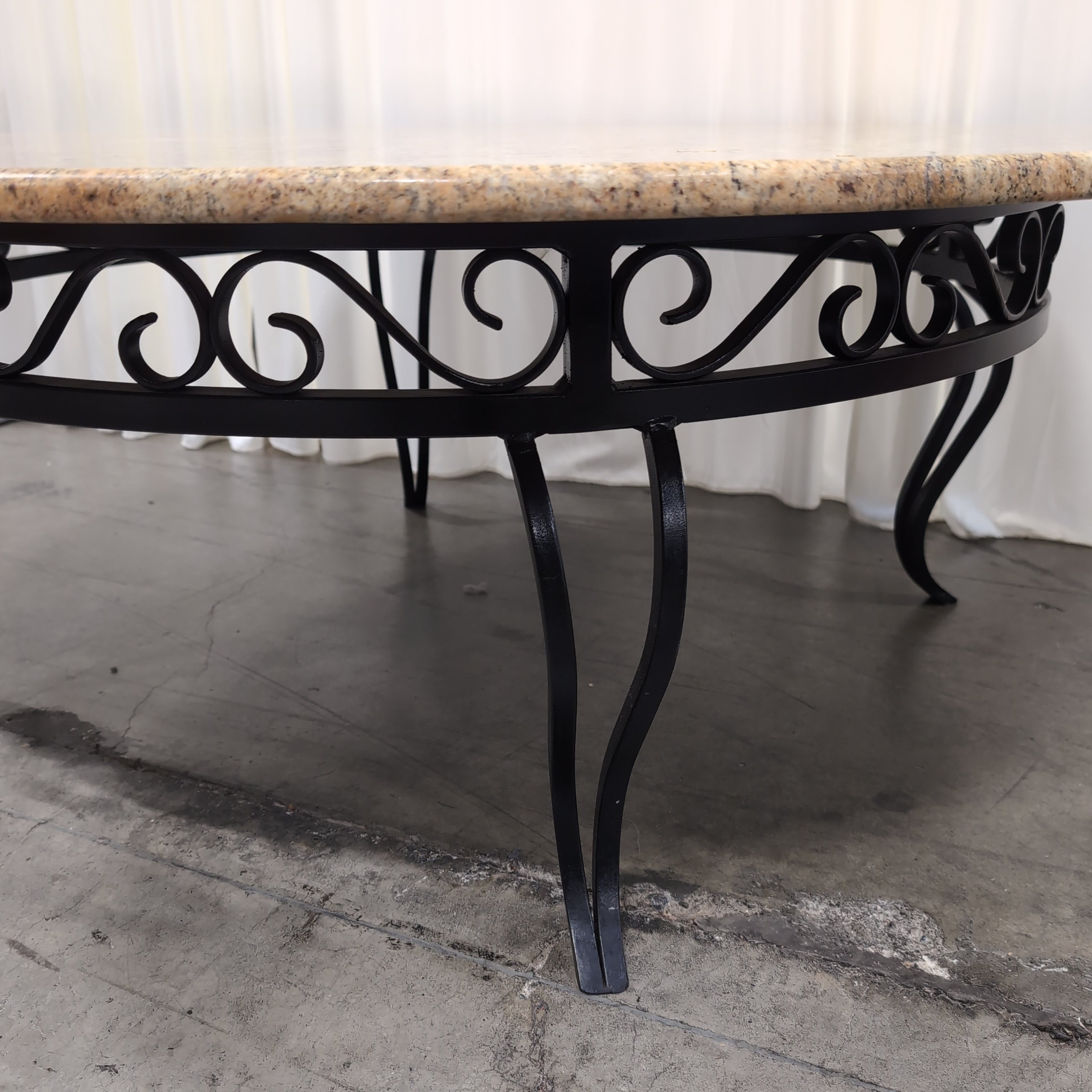 Oval Pink Speckled Granite Coffee Table with Wood Base