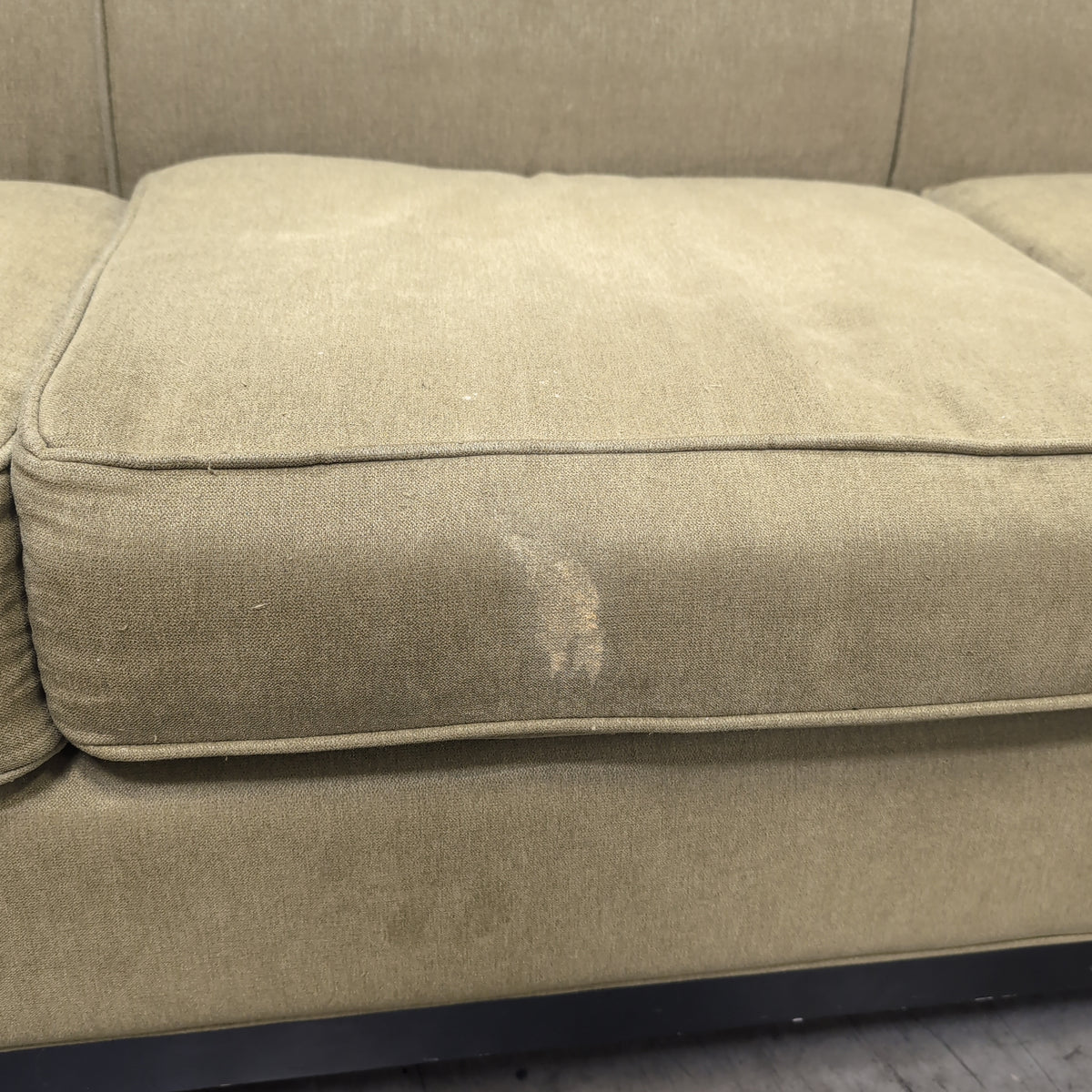 Tan Fabric Three-Cushion Couch with Rolled Arms