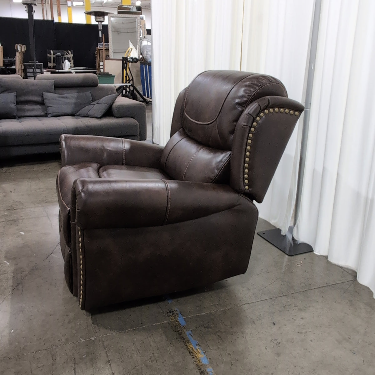 Dark Brown Padded Recliner with Nailhead Trim