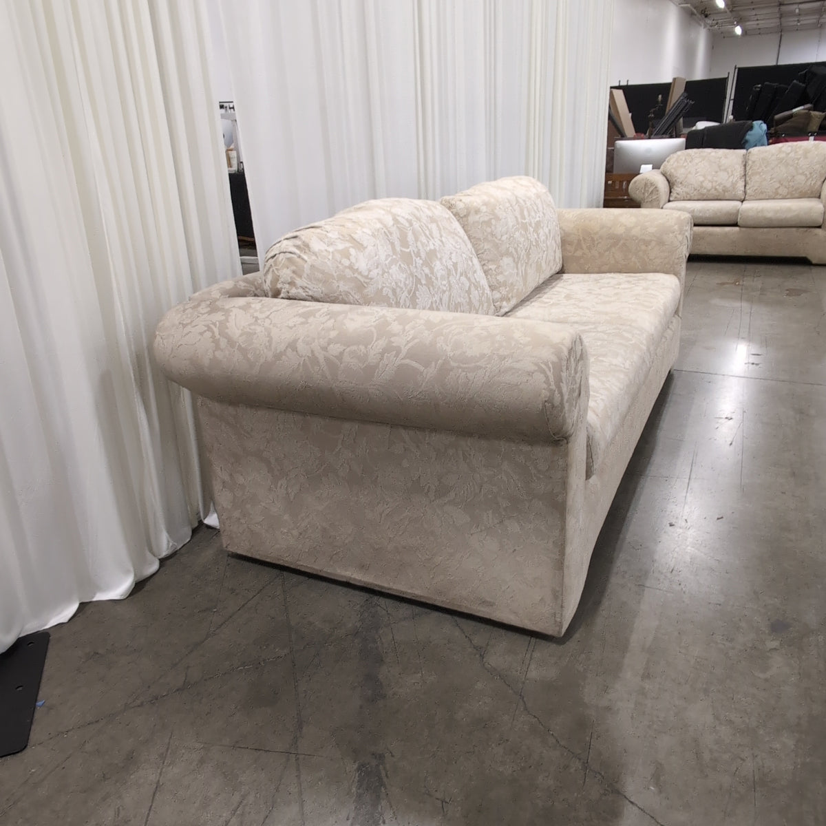 Traditional Rolled Arm Cream Upholstered Couch in Patterned Fabric