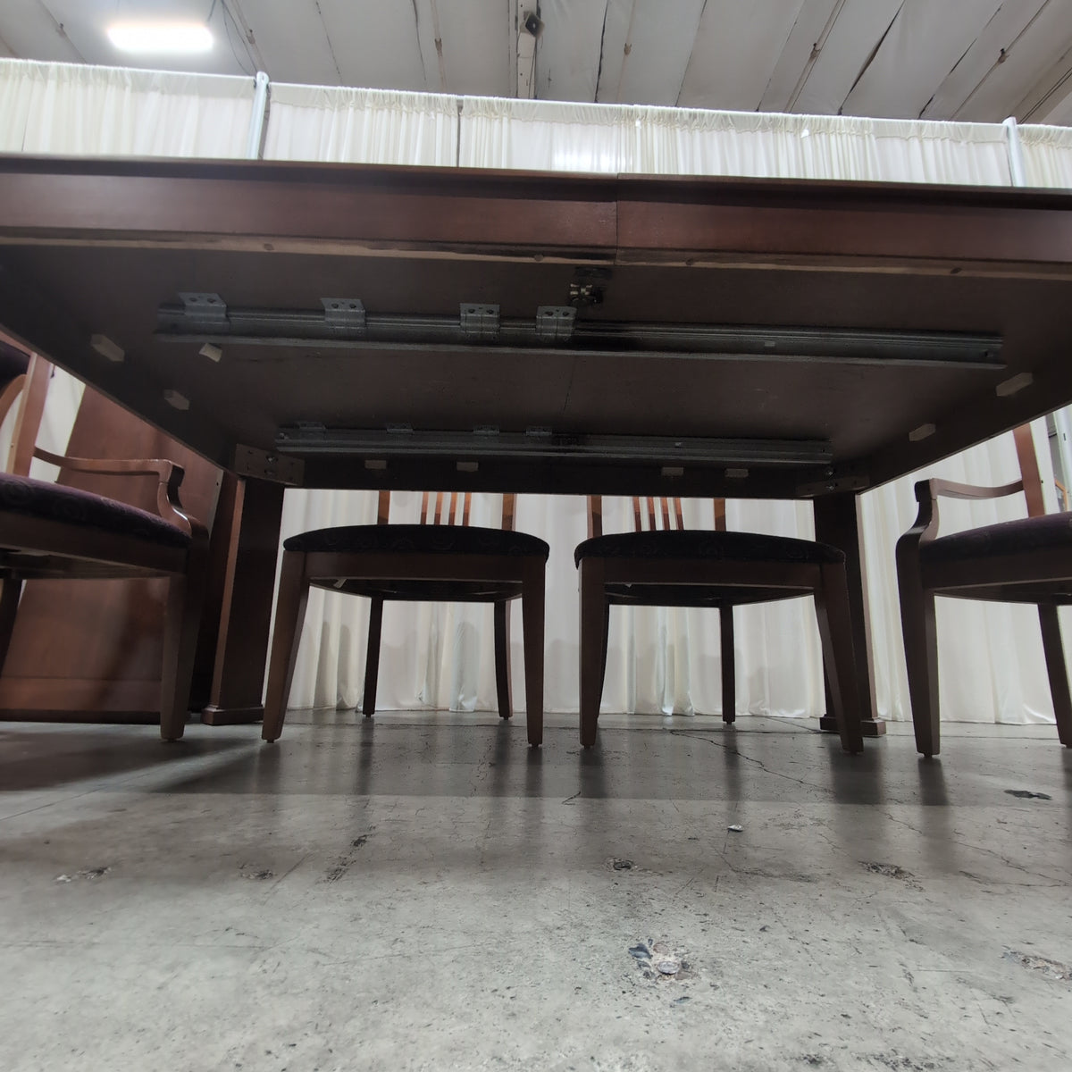 Dark Stained Wood Dining Table with Chamfered Corners
