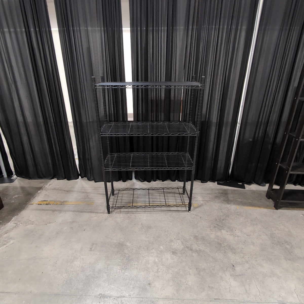 Black Four-Tier Wire Shelving Unit in Metal