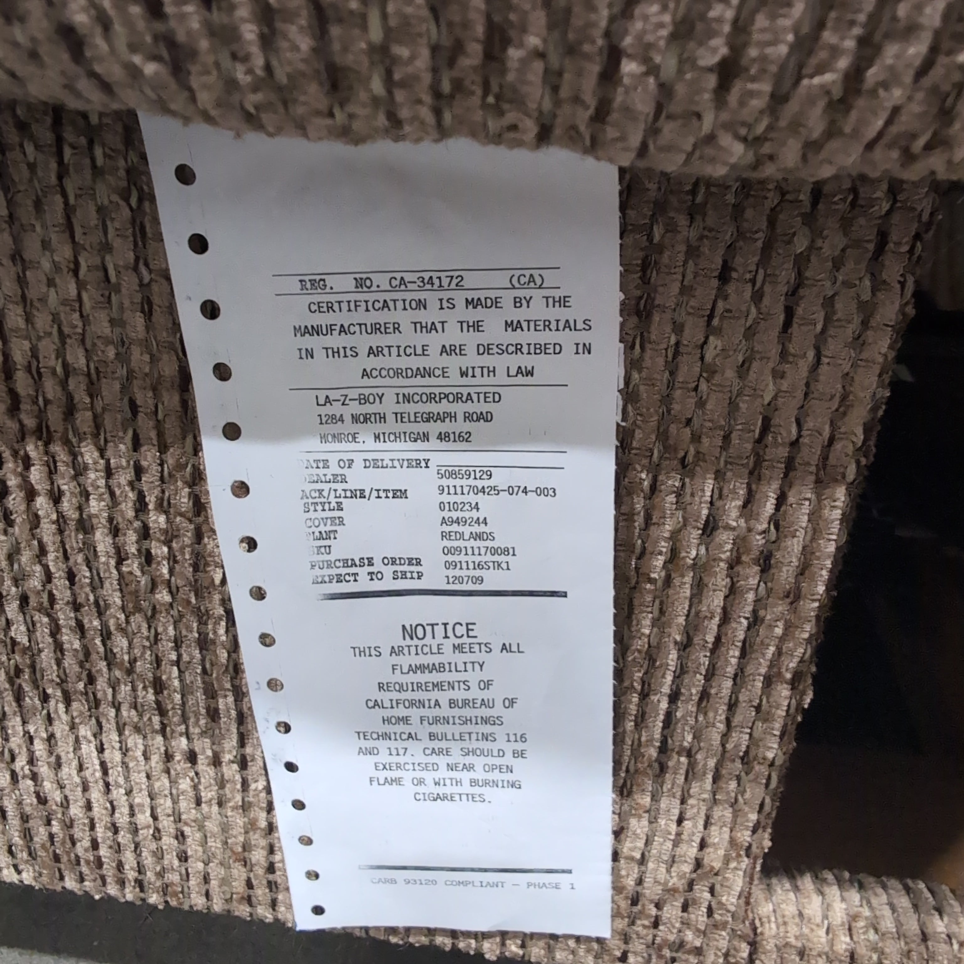Tan Textured Fabric Recliner with Rolled Arms