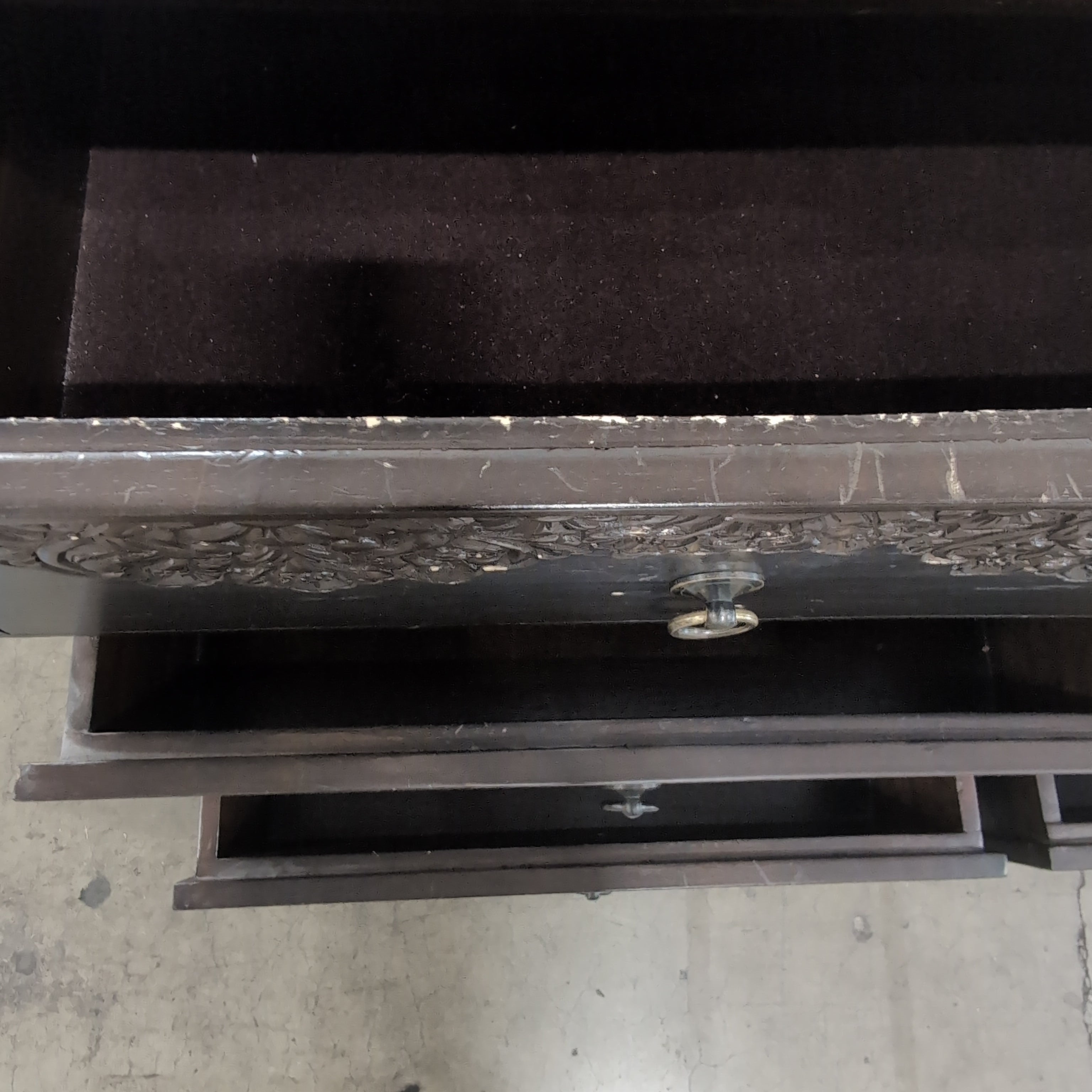 Dark Brown Six-Drawer Dresser with Ornate Carvings