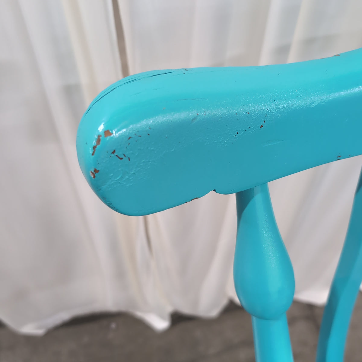 Bright Teal Spindle Back Rocking Chair in Wood