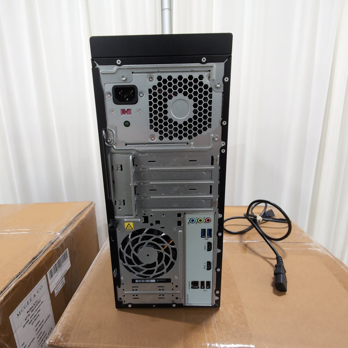 Black Desktop Computer Tower with Cables