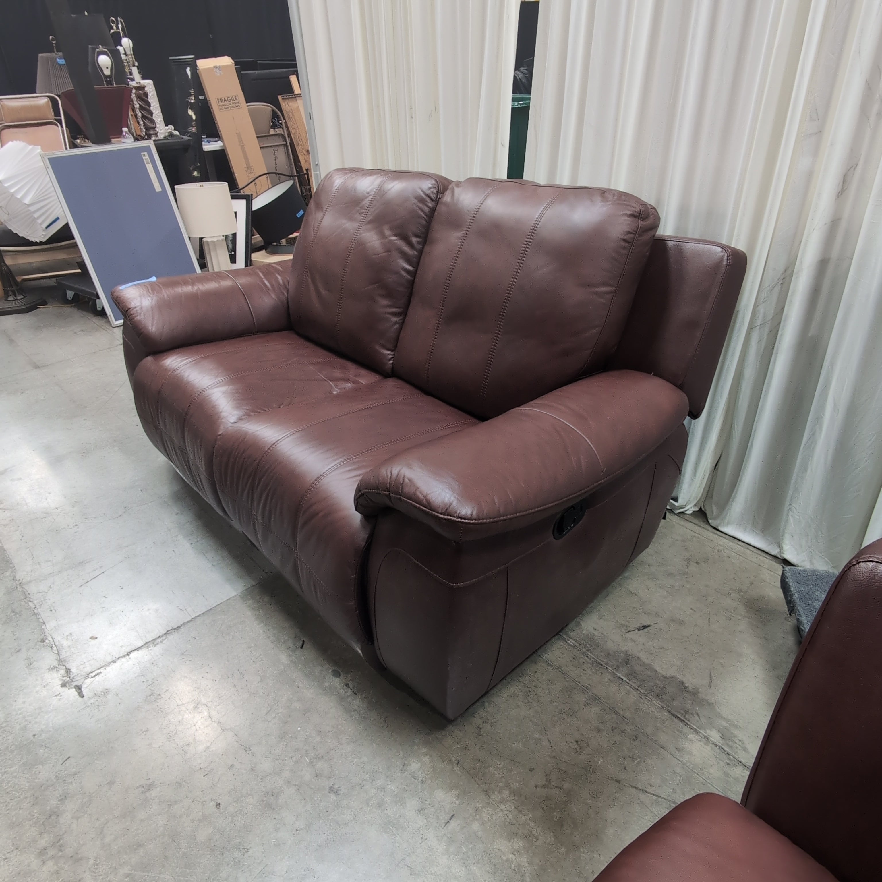 Deep Brown Leather Reclining Loveseat with Padded Arms