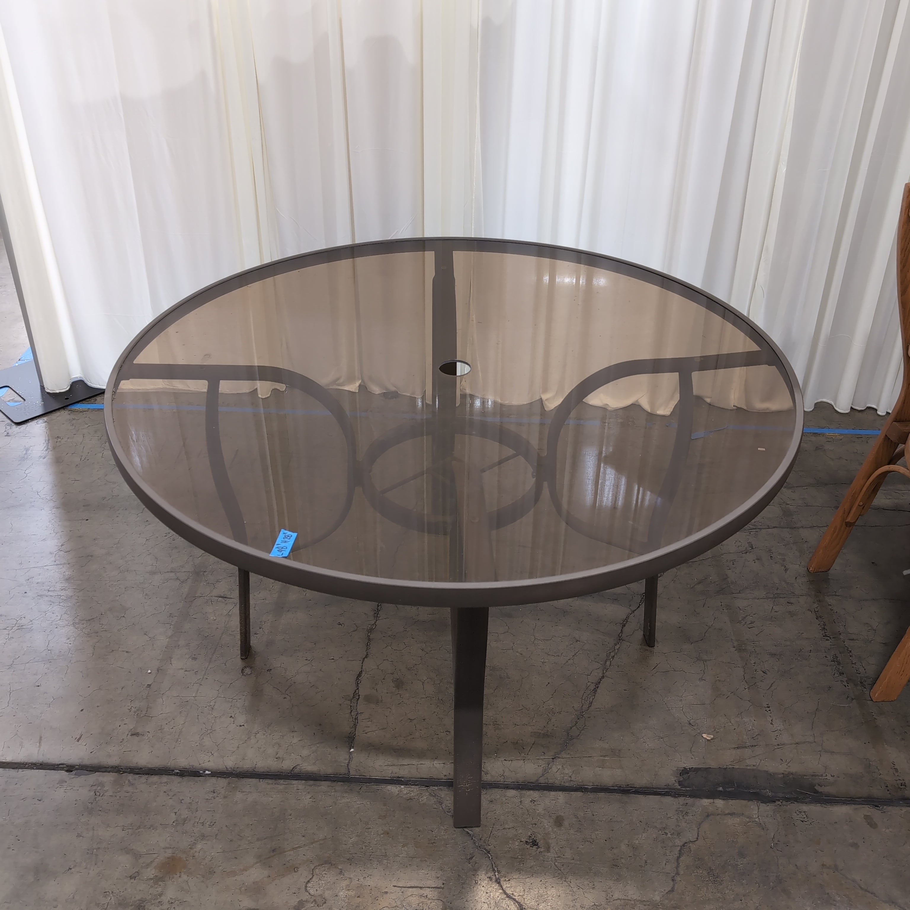 Round Smoked Glass Patio Dining Table in Metal