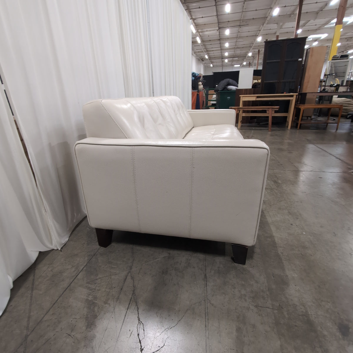Cream Tufted Leather Three-Seat Couch