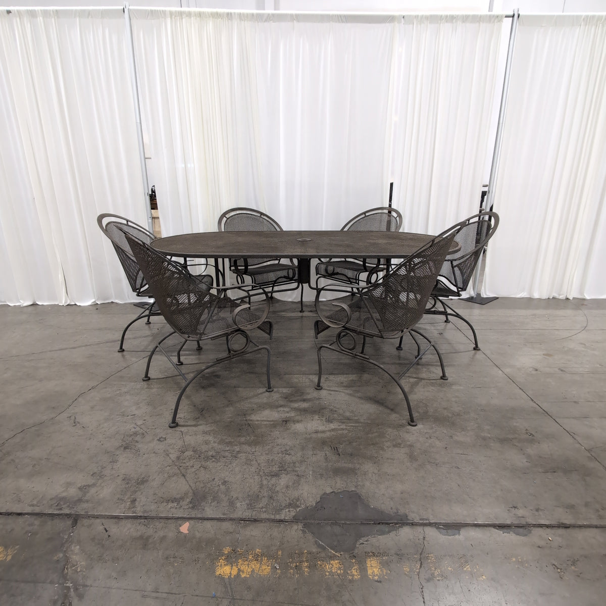 Dark Metal Oval Outdoor Table with Umbrella Hole