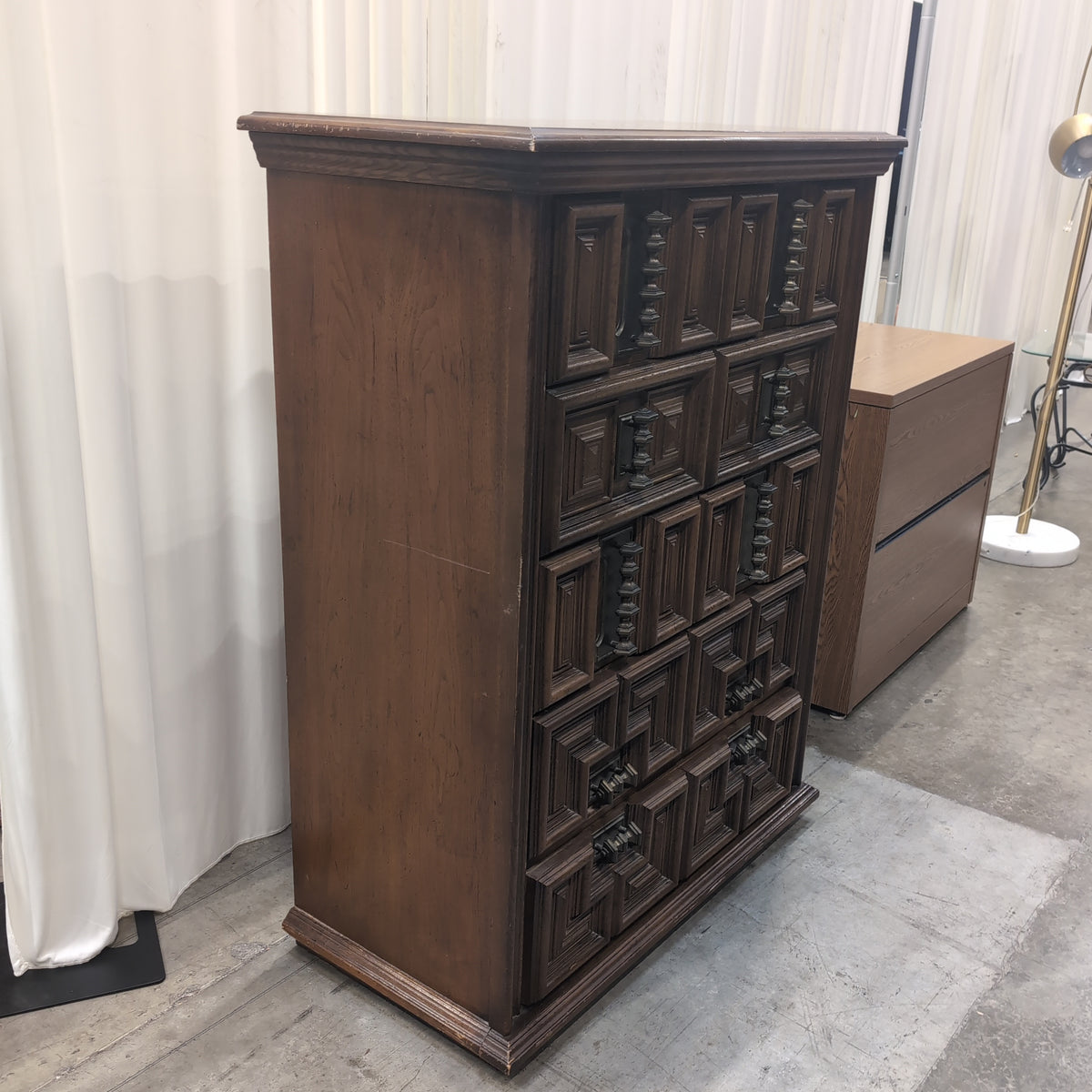 Dark Wood Carved Geometric Dresser with Ornate Hardware