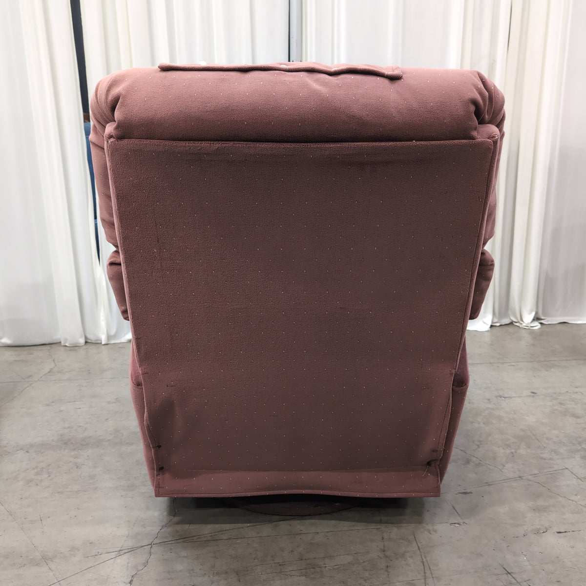 Padded Dusty Rose Fabric Swivel Recliner with Polka Dots