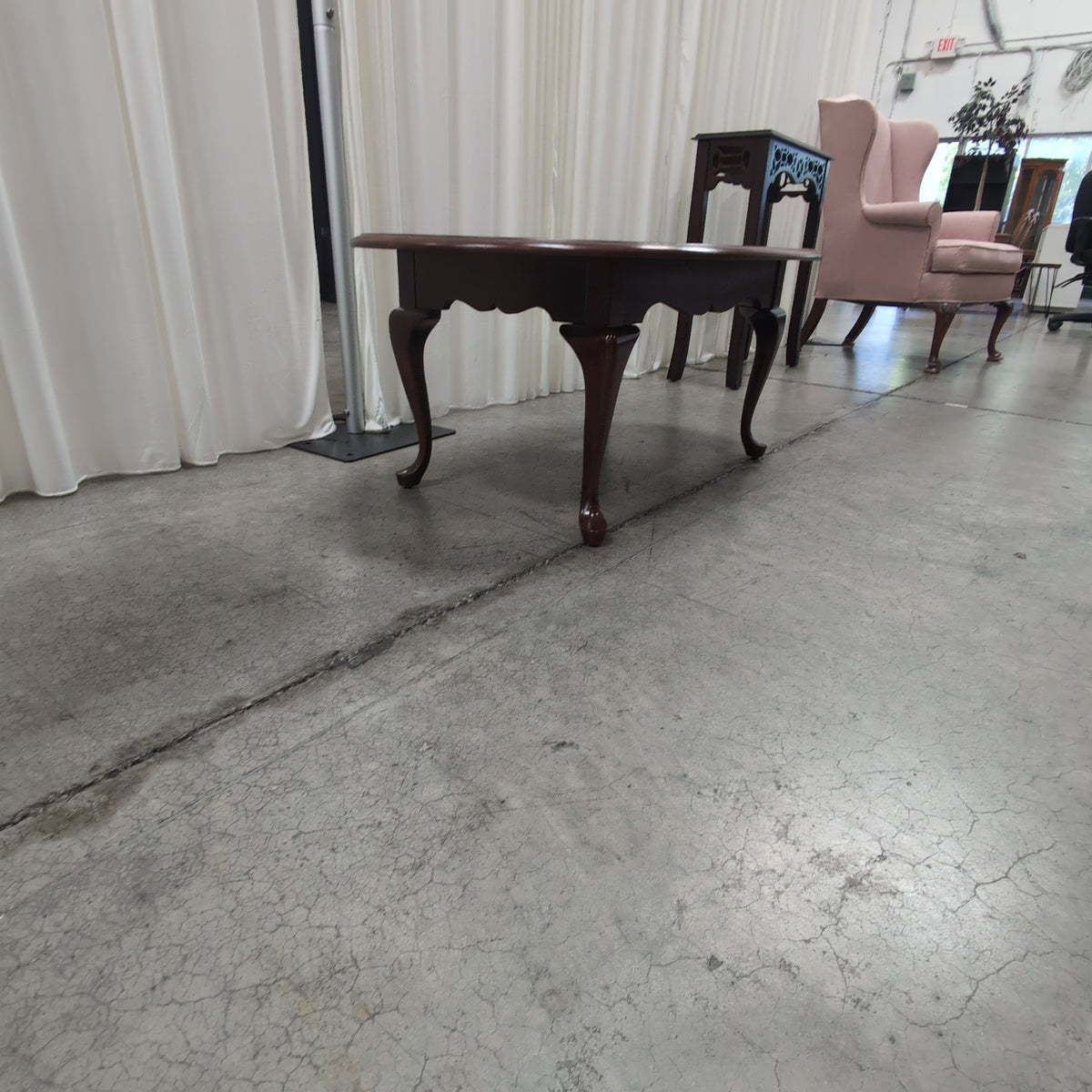 Dark Cherry Oval Wood Coffee Table with Cabriole Legs