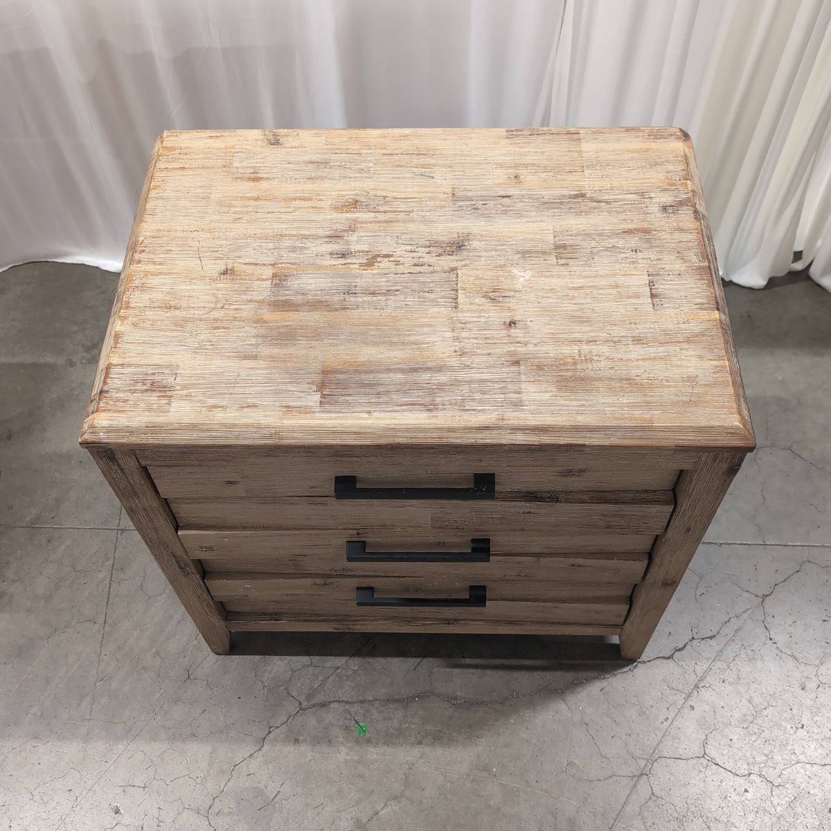Distressed Light Wood Three-Drawer Nightstand