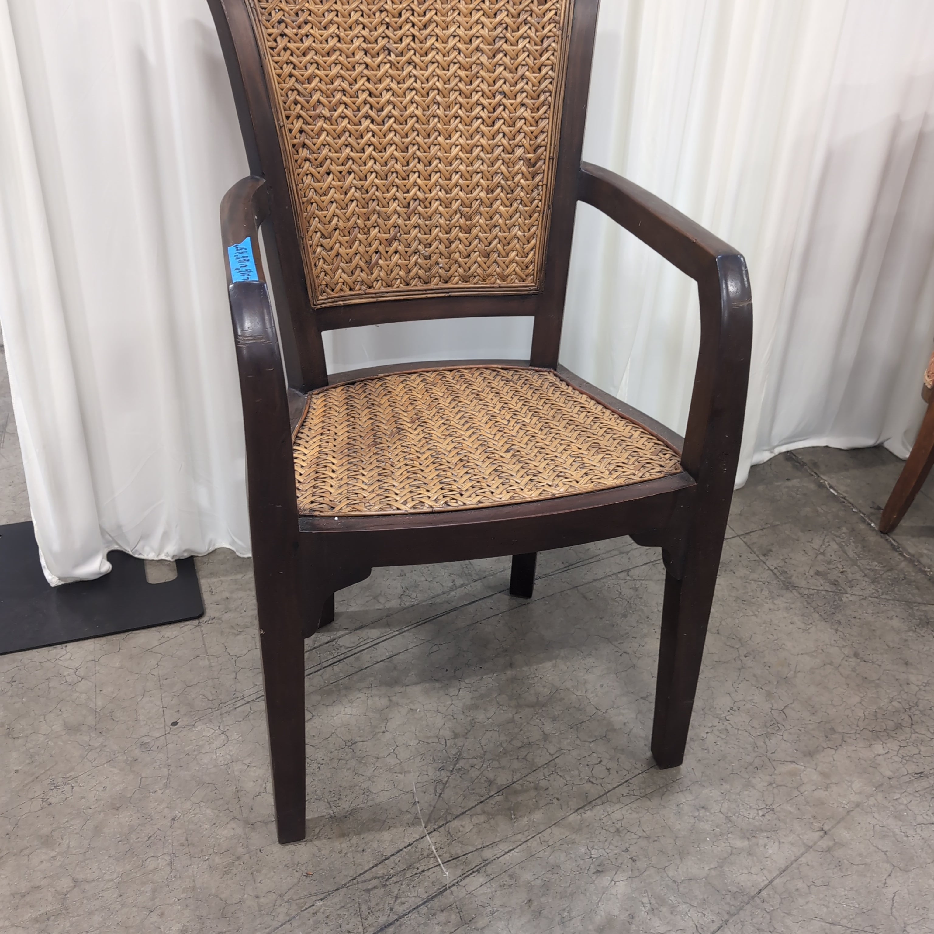 Dark Wood Armchair with Woven Cane Details
