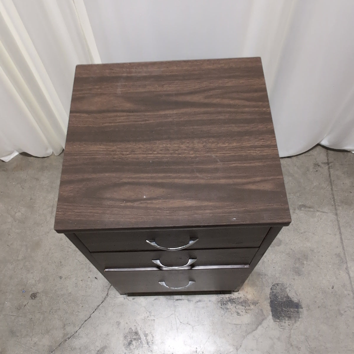 Dark Brown Wood Three-Drawer Nightstand