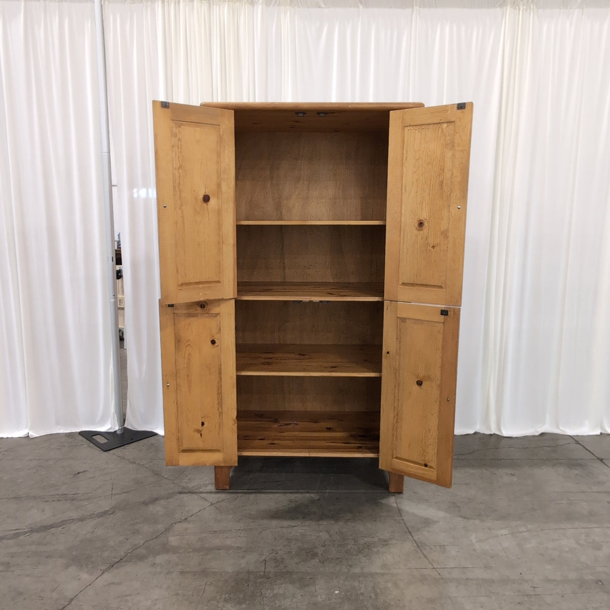 Rustic Pine Four-Door Pantry Cabinet in Natural Wood