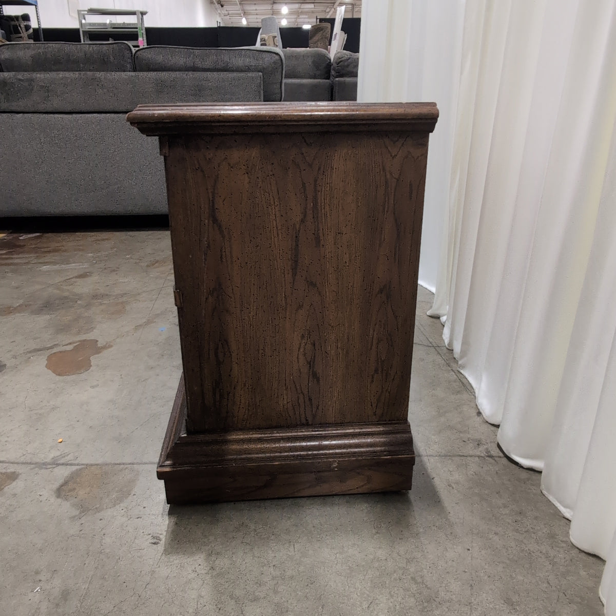 Traditional Dark Wood Dresser with Ornate Hardware