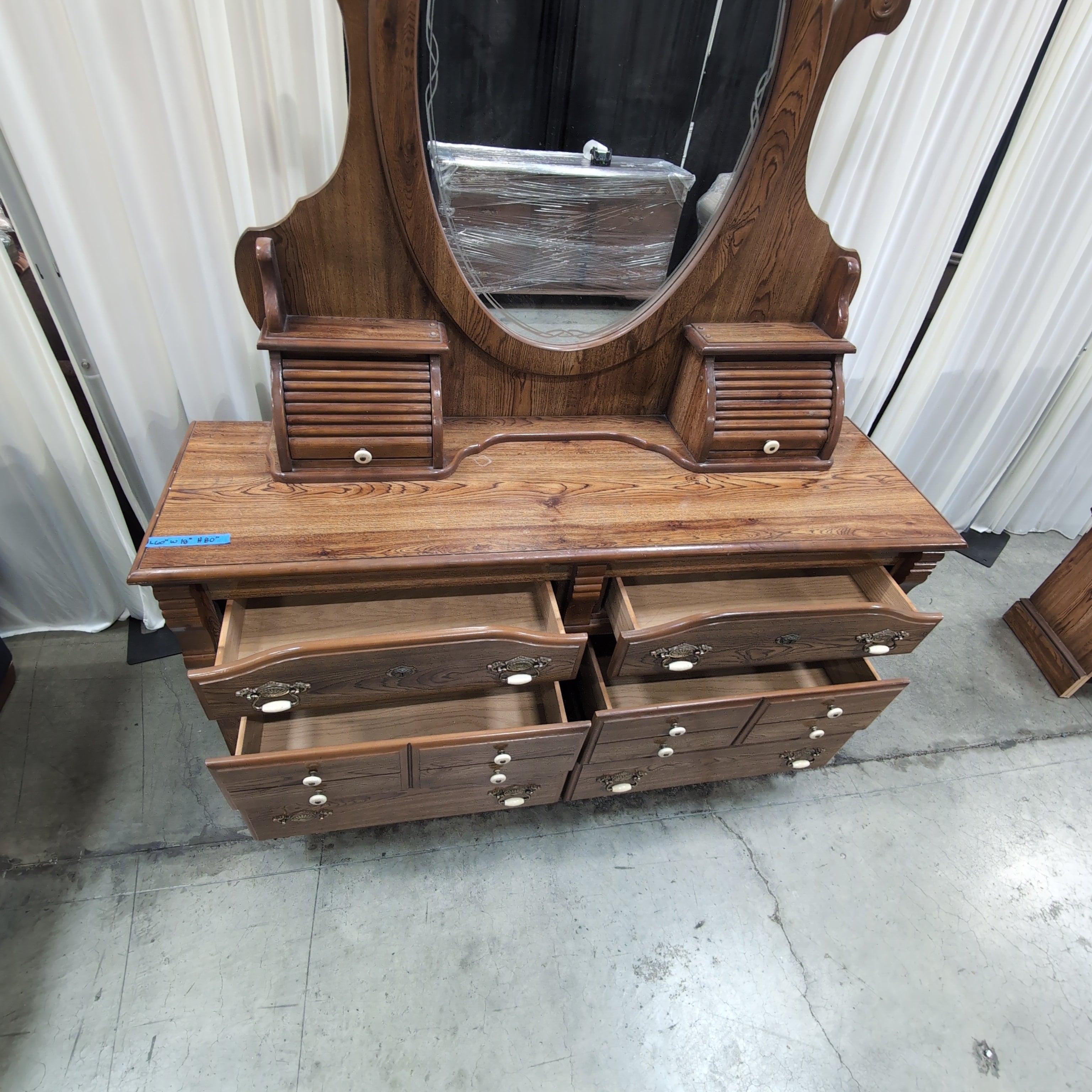 Ornate Hardwood Six-Drawer Dresser with Mirror
