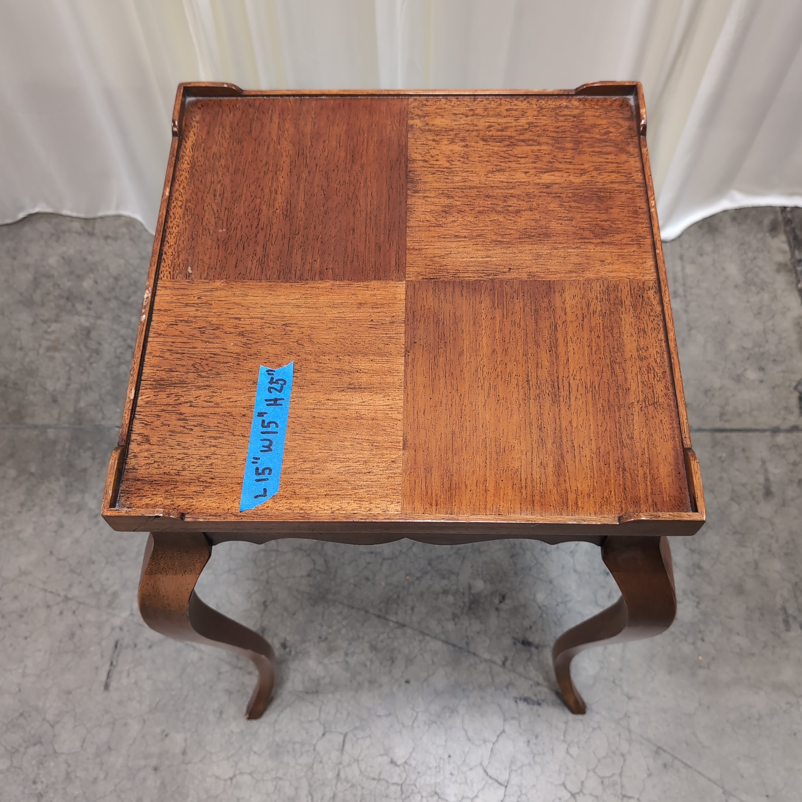 Dark Wood Scalloped End Table with Curved Legs