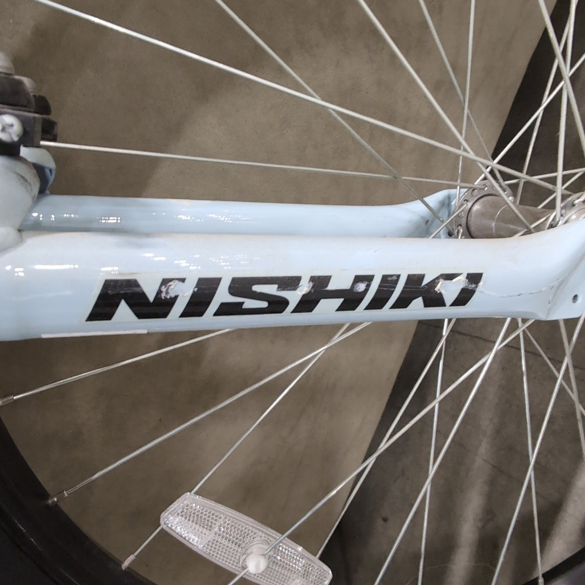 Black Nishiki Pueblo Mountain Bicycle with Front Suspension