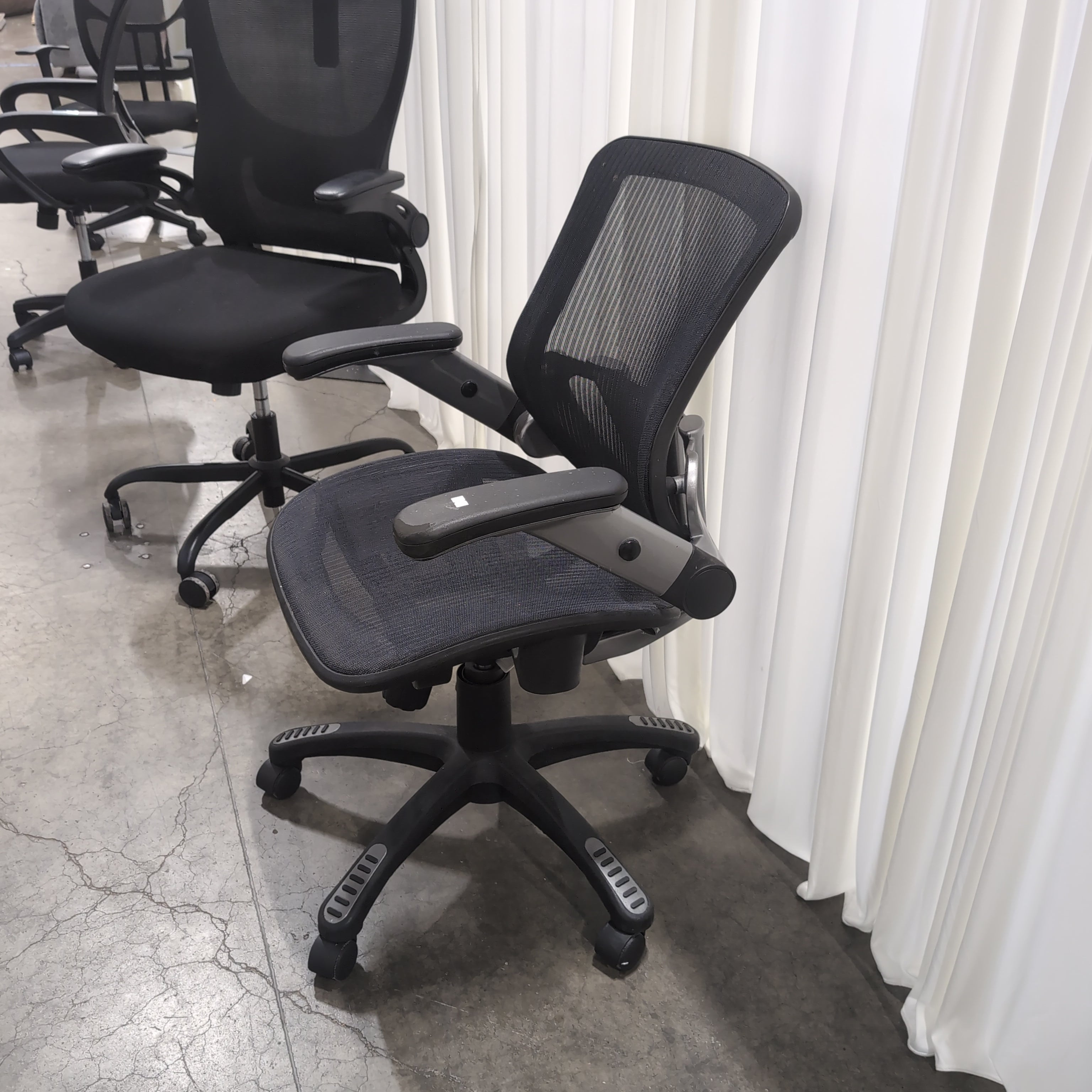 Black Mesh Rolling Office Chair with Adjustable Arms