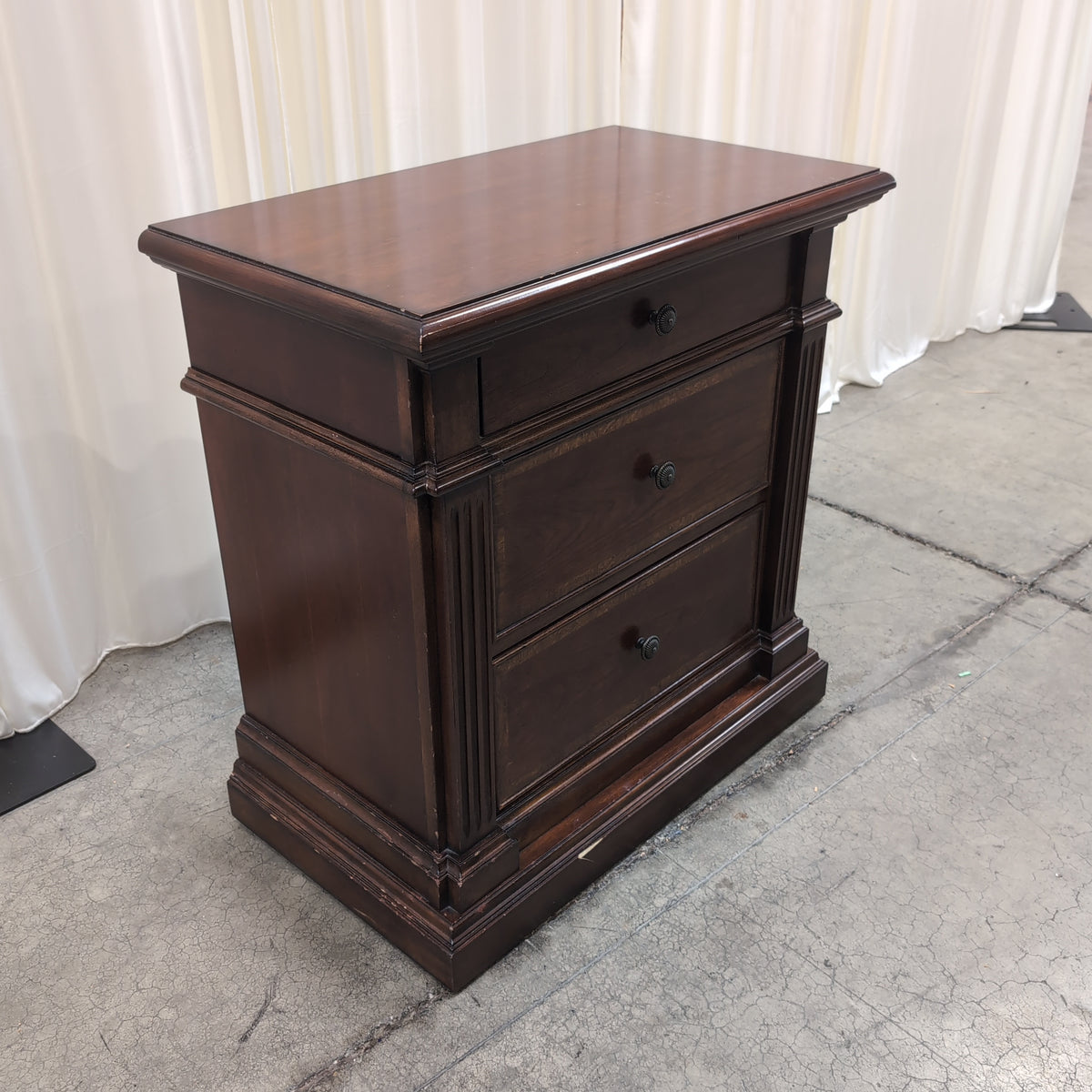 Traditional Dark Wood Three-Drawer Nightstand