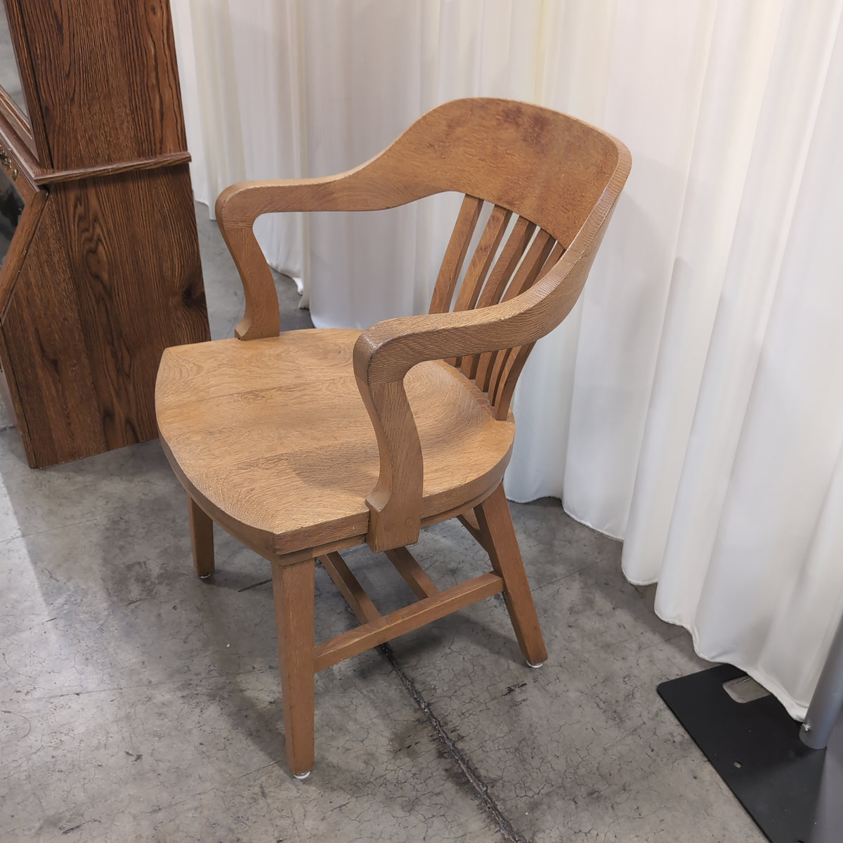 Golden Oak Curved Back Arm Chair with Slatted Spindles