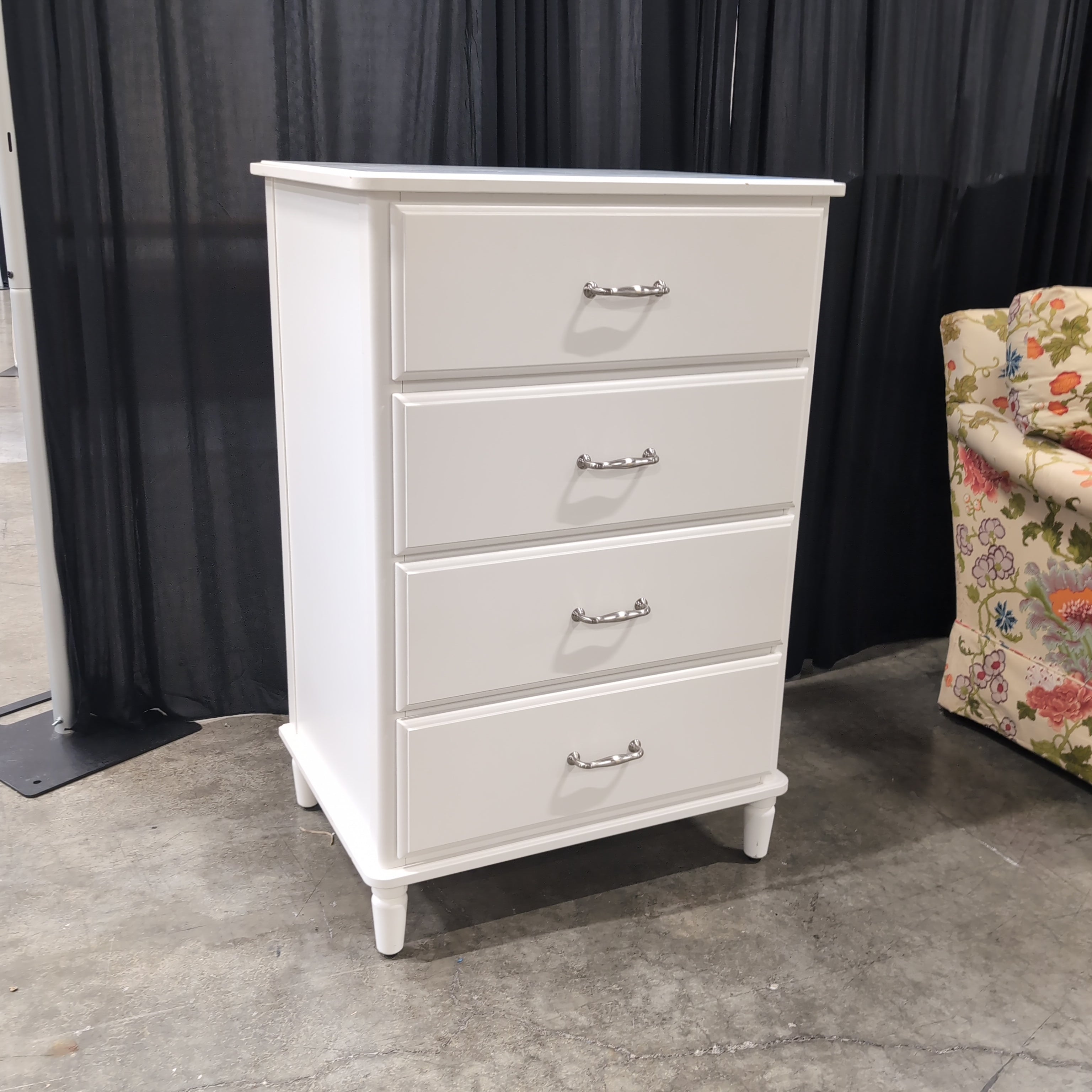 White Four-Drawer Dresser with Silver Pulls