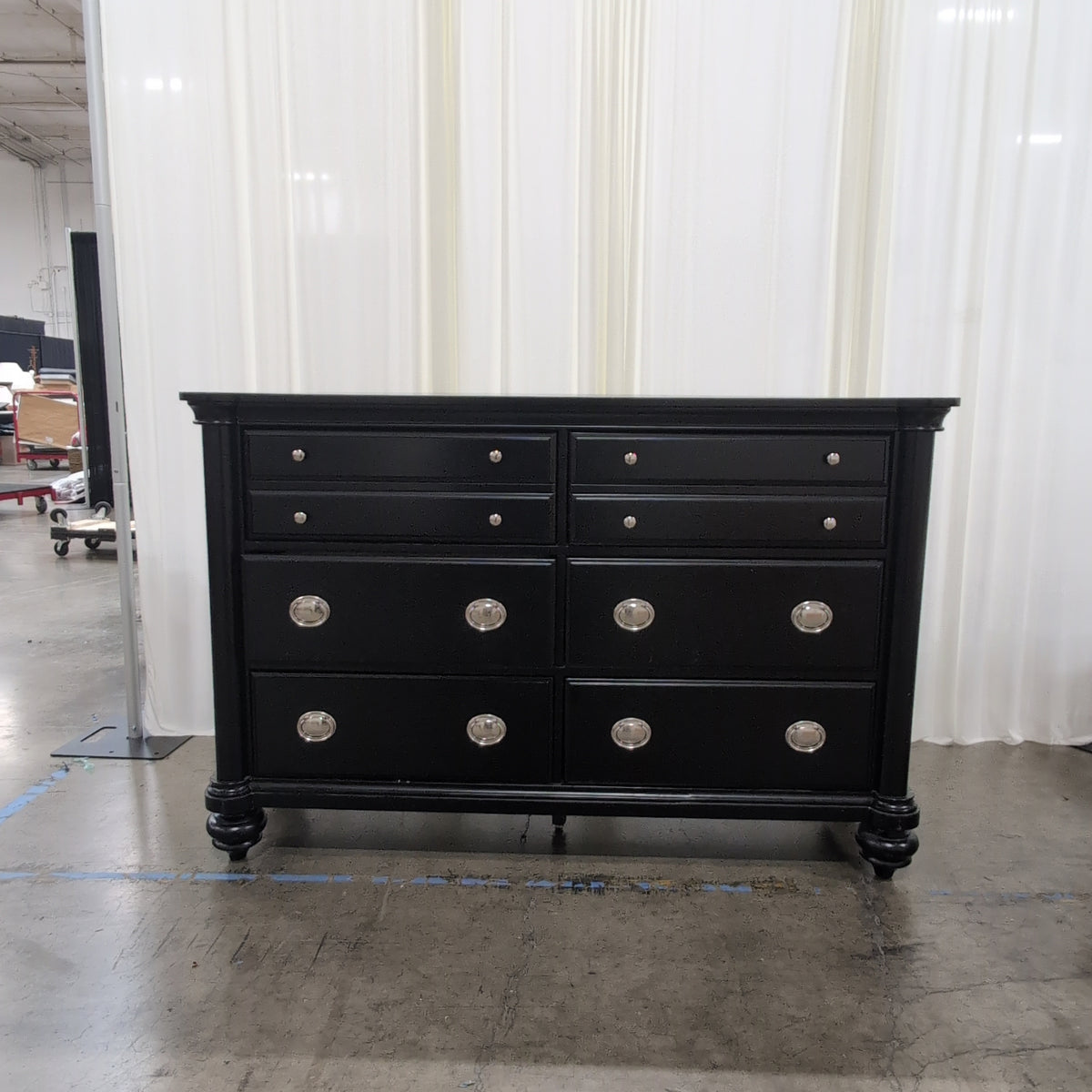 Black Eight-Drawer Traditional Dresser with Silver Hardware