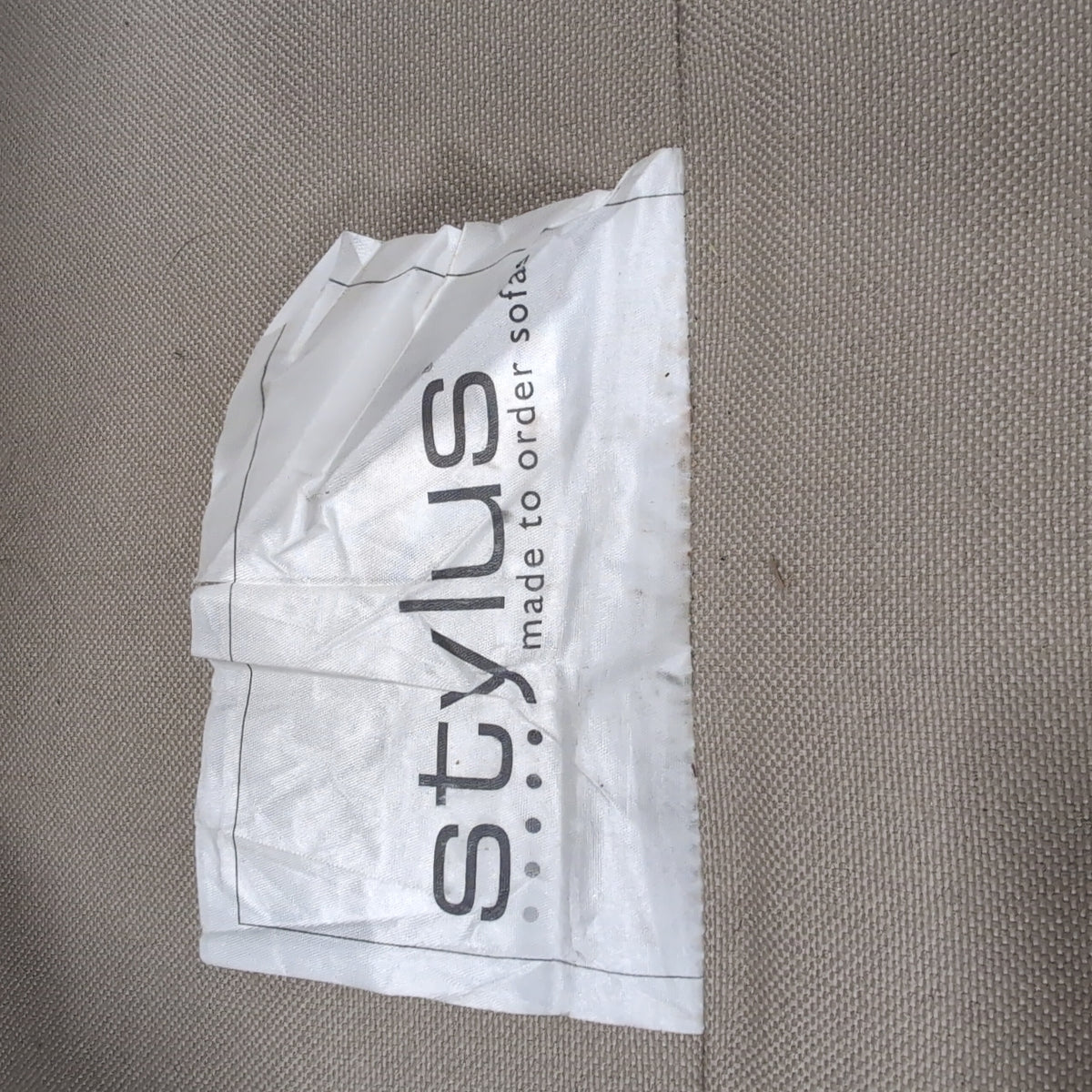 Tan Fabric Rolled Arm Loveseat