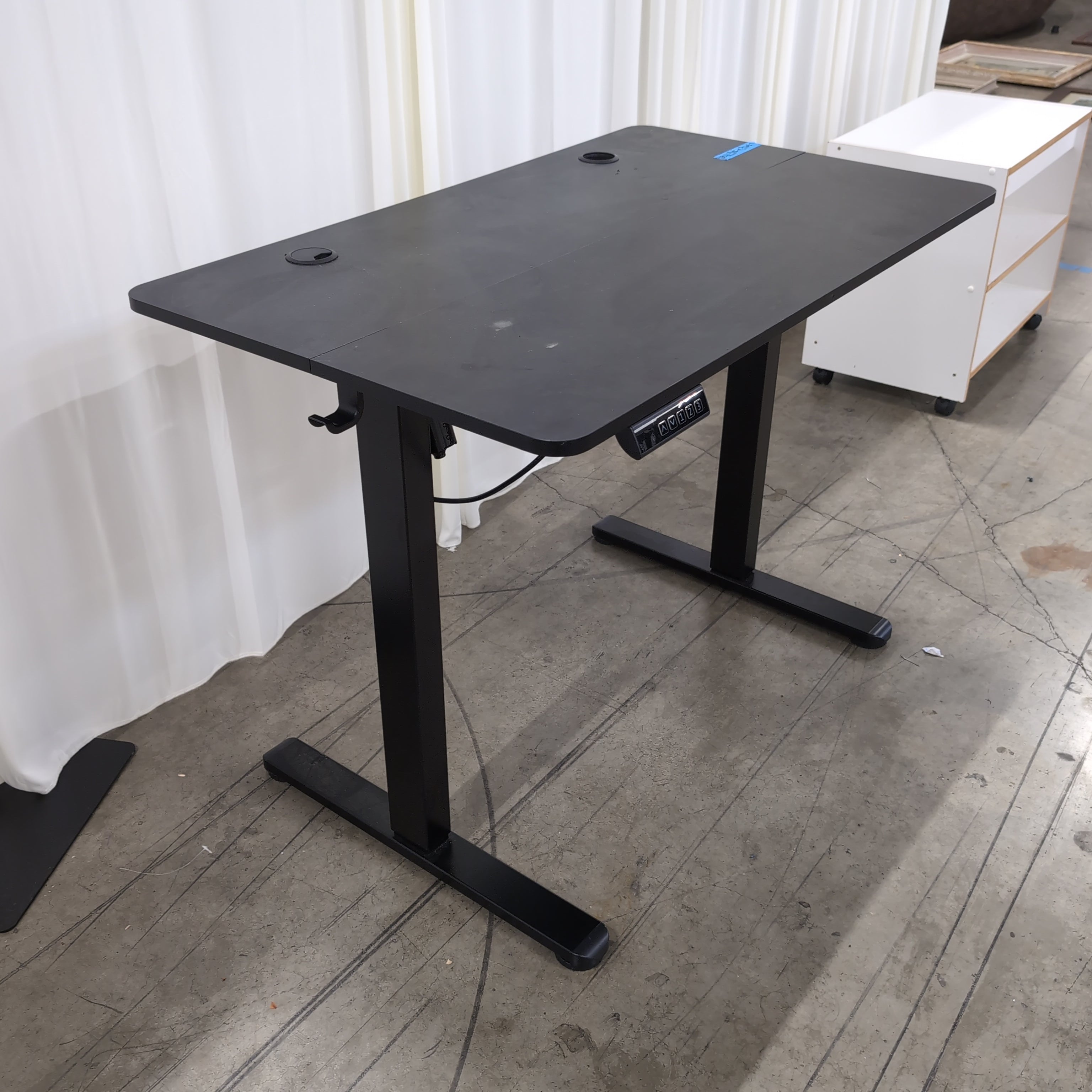 Black Electric Height-Adjustable Desk with Grommet Holes