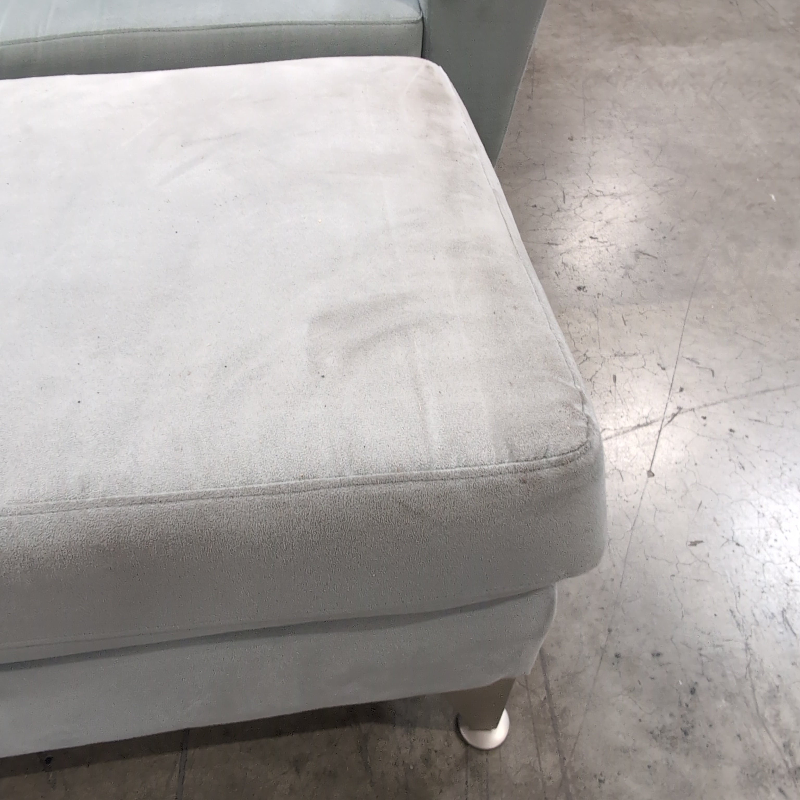 Light Grey Upholstered Couch with Tufted Back