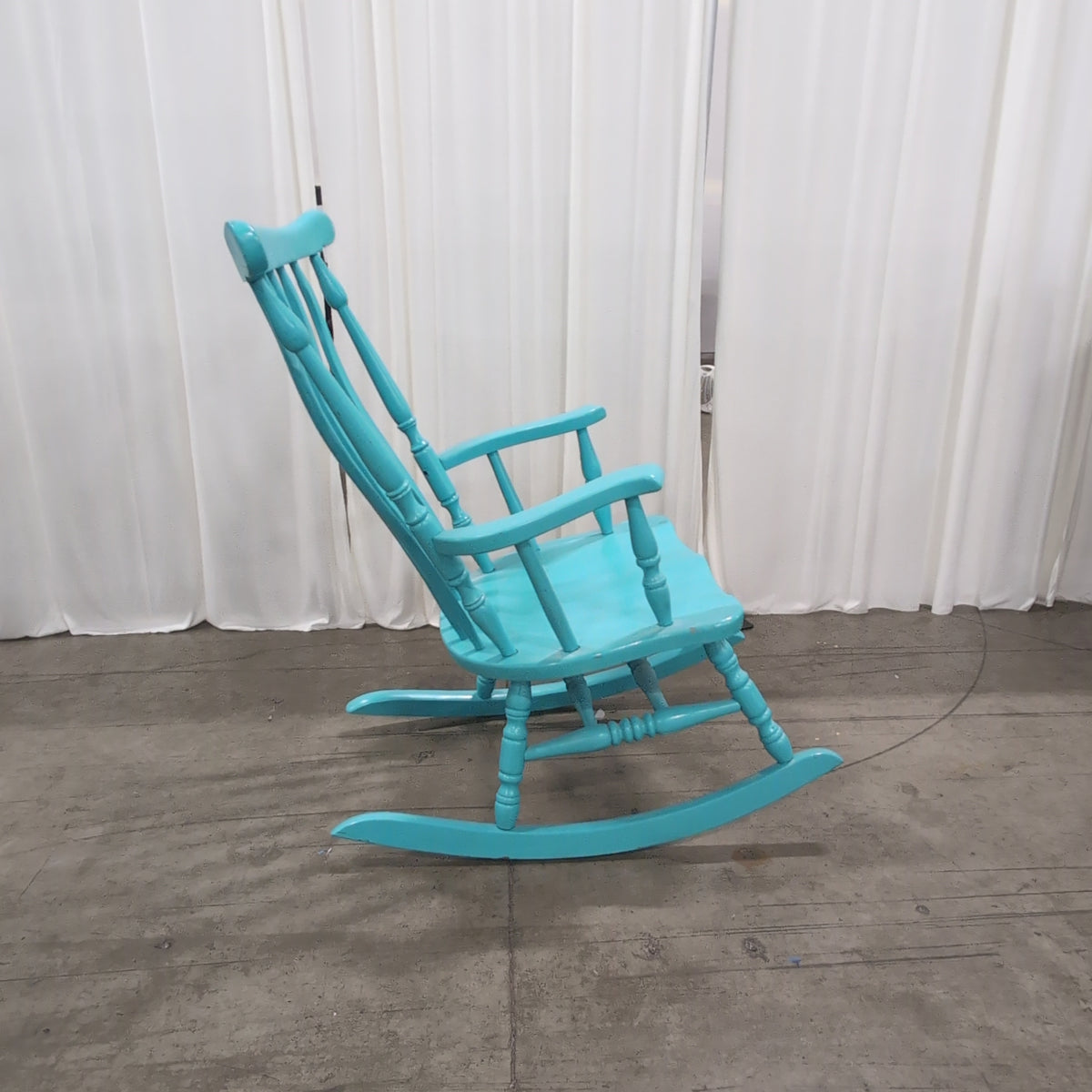 Bright Teal Spindle Back Rocking Chair in Wood