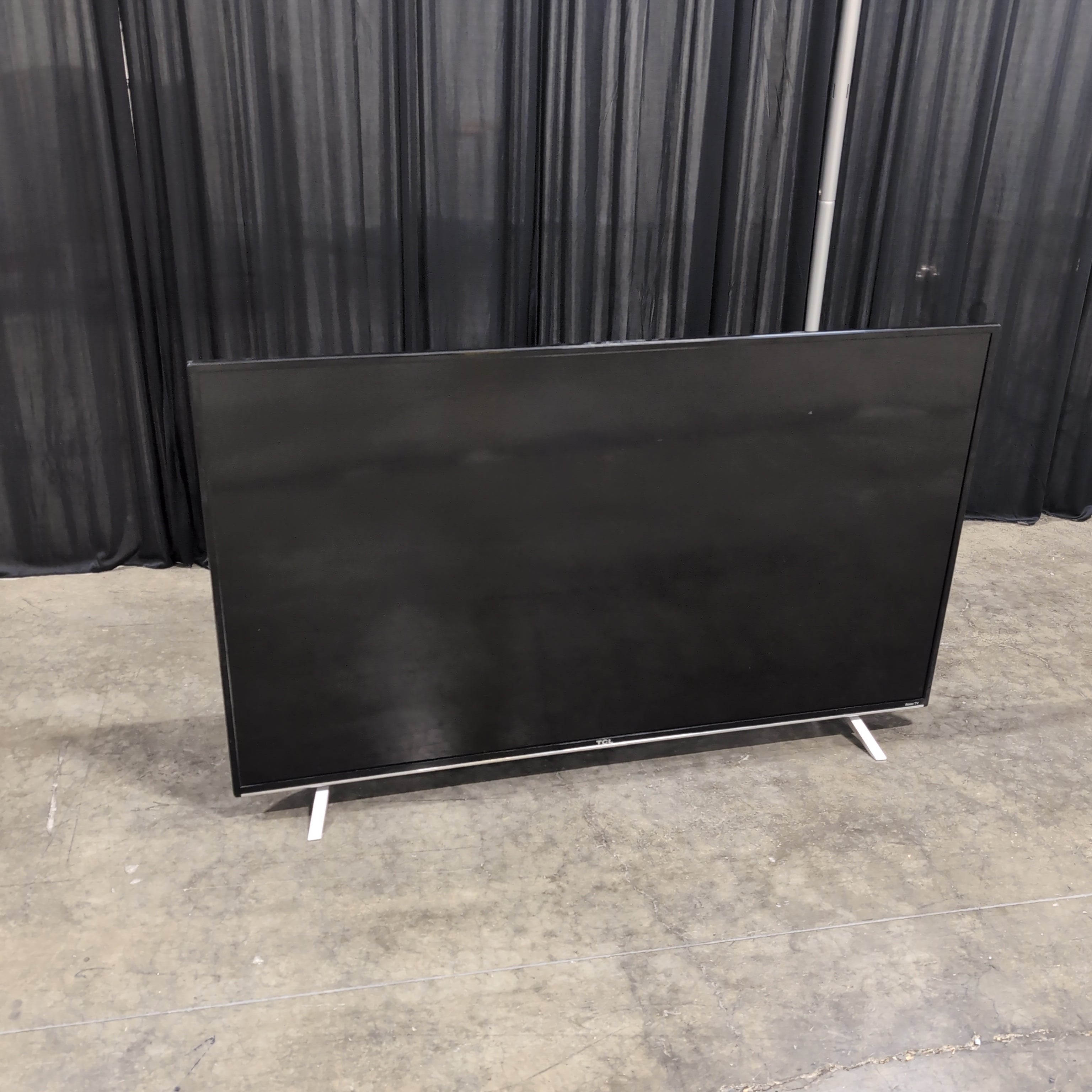 TCL 55-inch Black Flat Screen TV with Stand